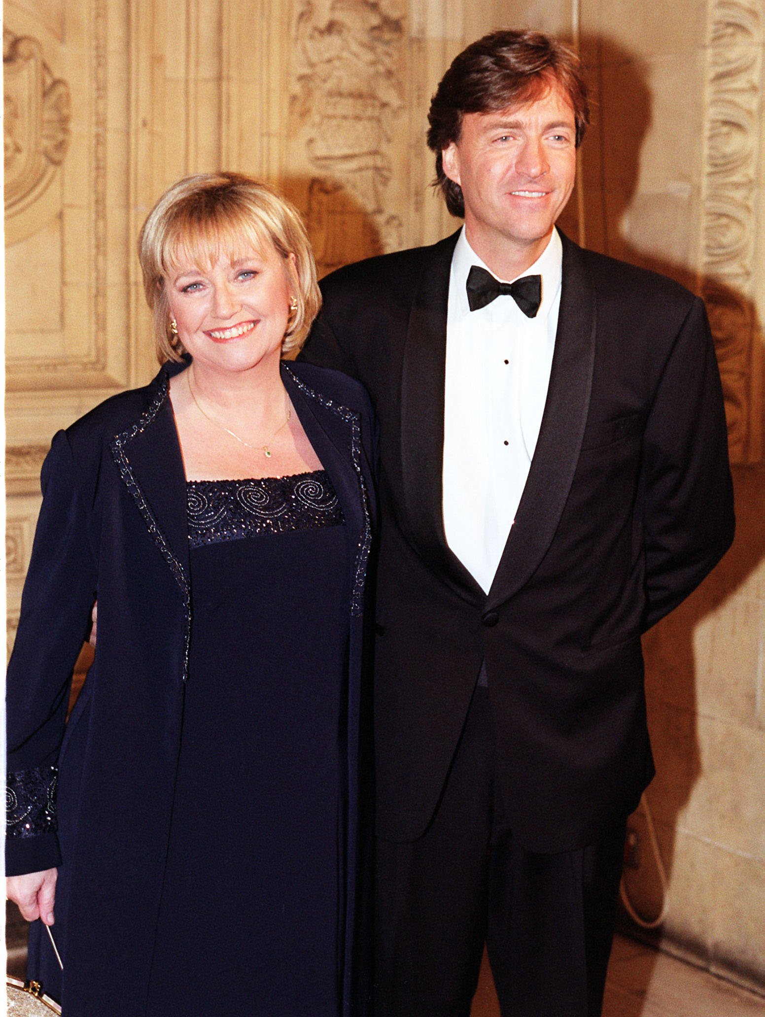 Judy Finnigan and Richard Madeley attend the National Television Awards at London's Royal Albert Hall on 26 October 1999, their formal attire and composed presence reflecting their standing at the height of their television success, as they continued to captivate audiences both on-screen and at major industry events.