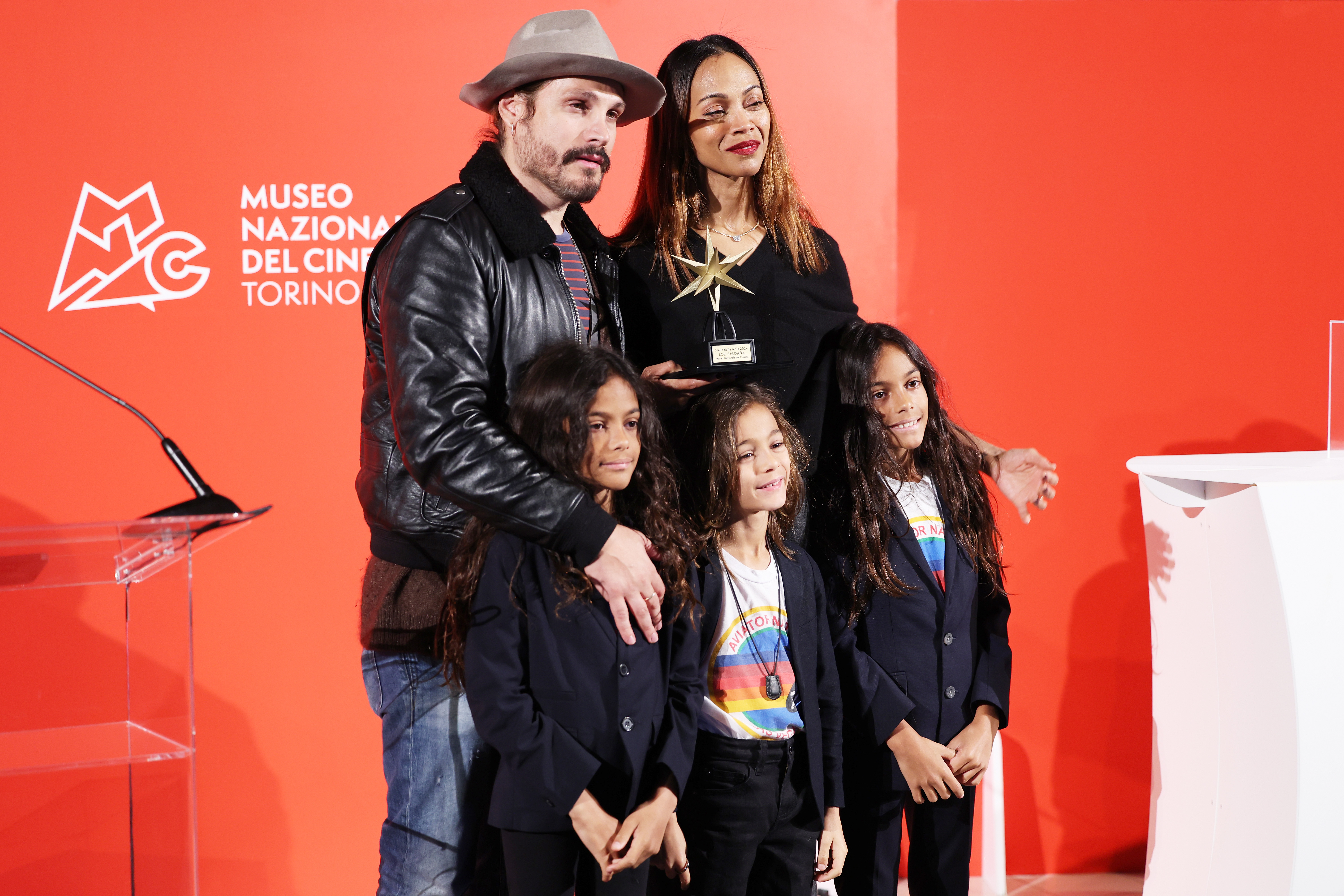 Marco Perego and Zoe Saldaña with their kids Cy, Bowie, and Zen Perego-Saldaña. | Source: Getty Images