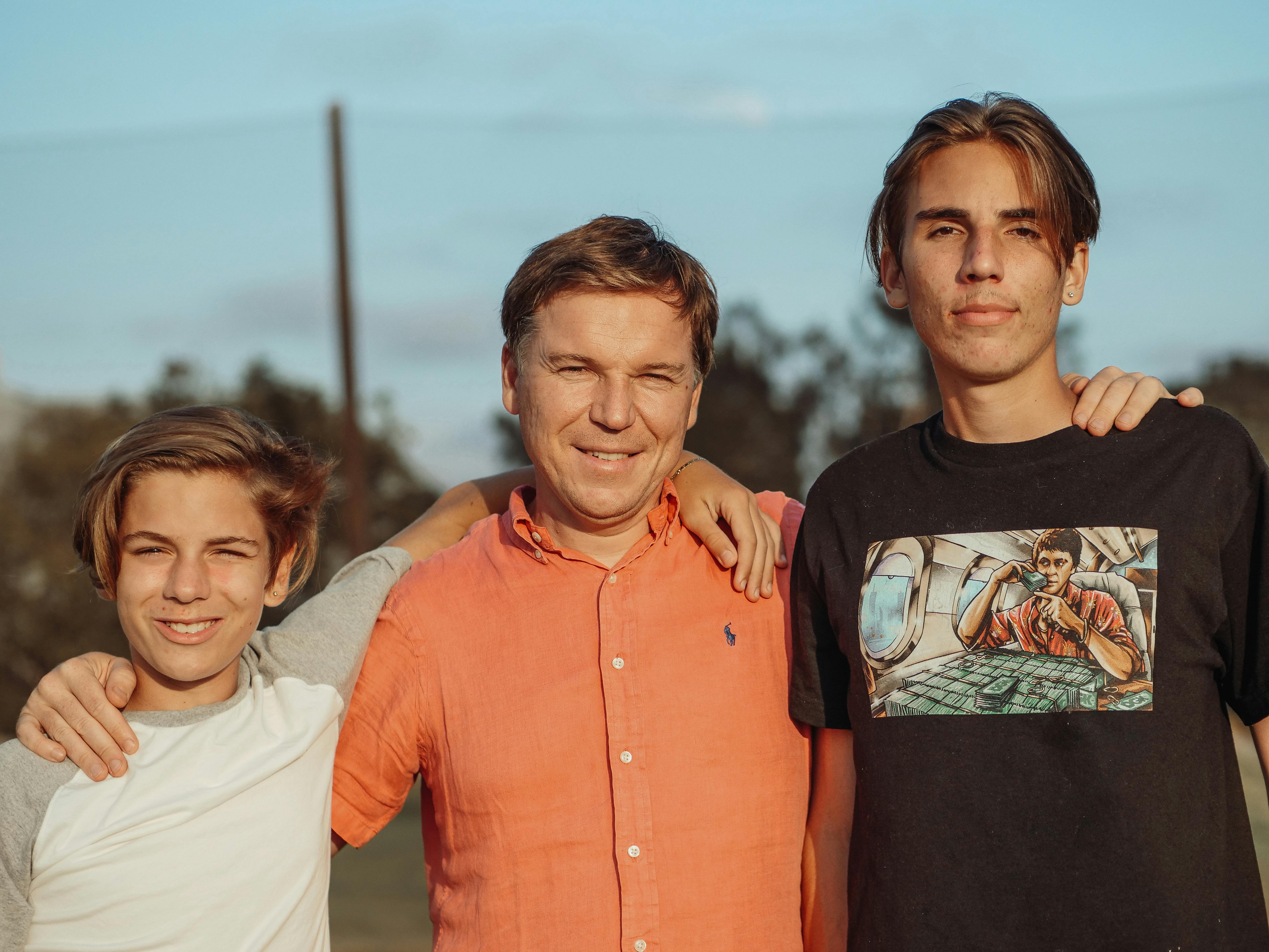 A father with his sons | Source: Pexels