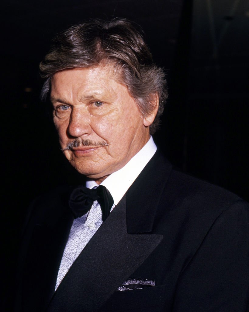 Charles Bronson (1921-2003), US actor, wearing a dinner jacket and bow tie, circa 1985. | Photo: Getty Images