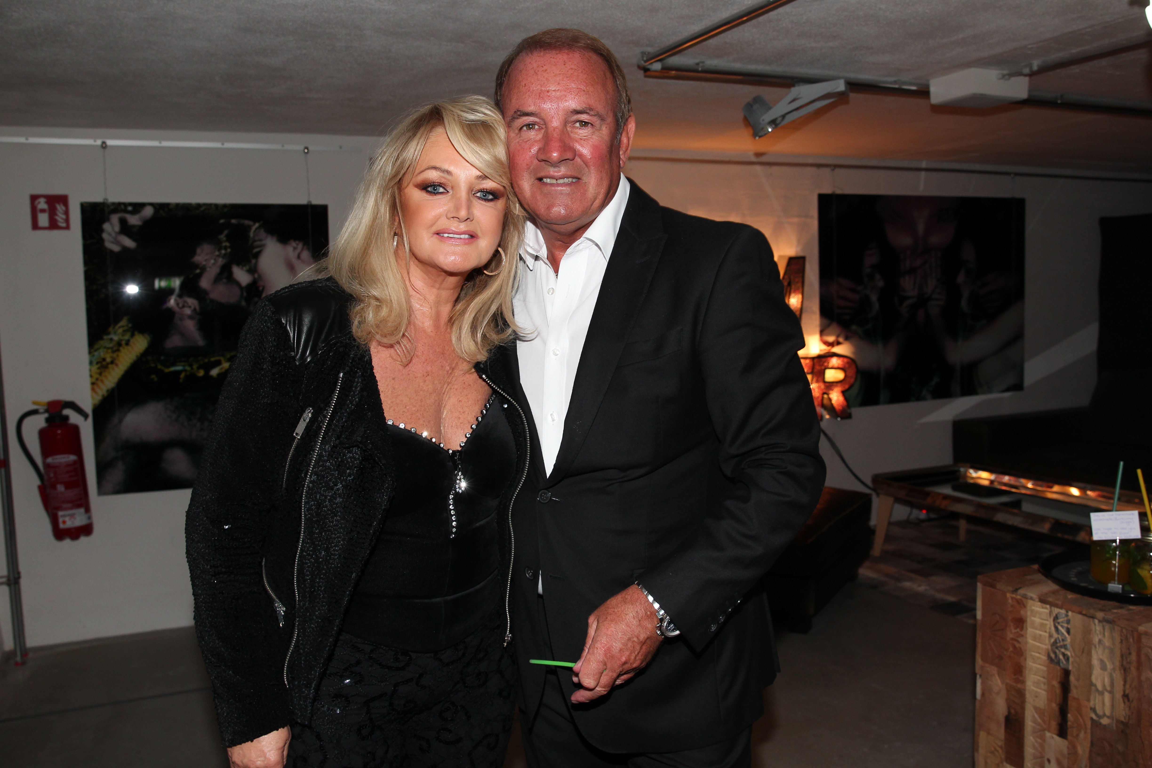 Bonnie Tyler and her husband Robert Sullivan attend the grand opening of KARE Kraftwerk on 9 October 2014 in Munich, Germany. | Source: Getty Images