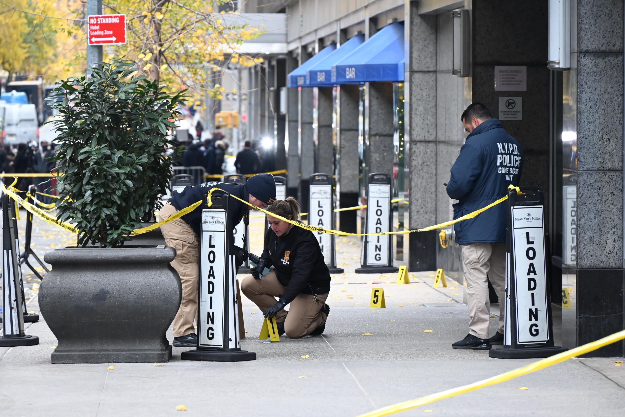 Police are at the crime scene outside the Hilton Hotel in Midtown Manhattan, New York City, on December 4, 2024 | Source: Getty Images