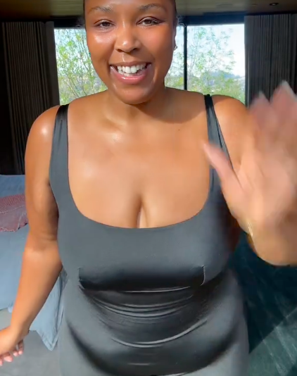 Lizzo expressing happiness concerning reaching her weight release goal. | Source: TikTok/lizzo