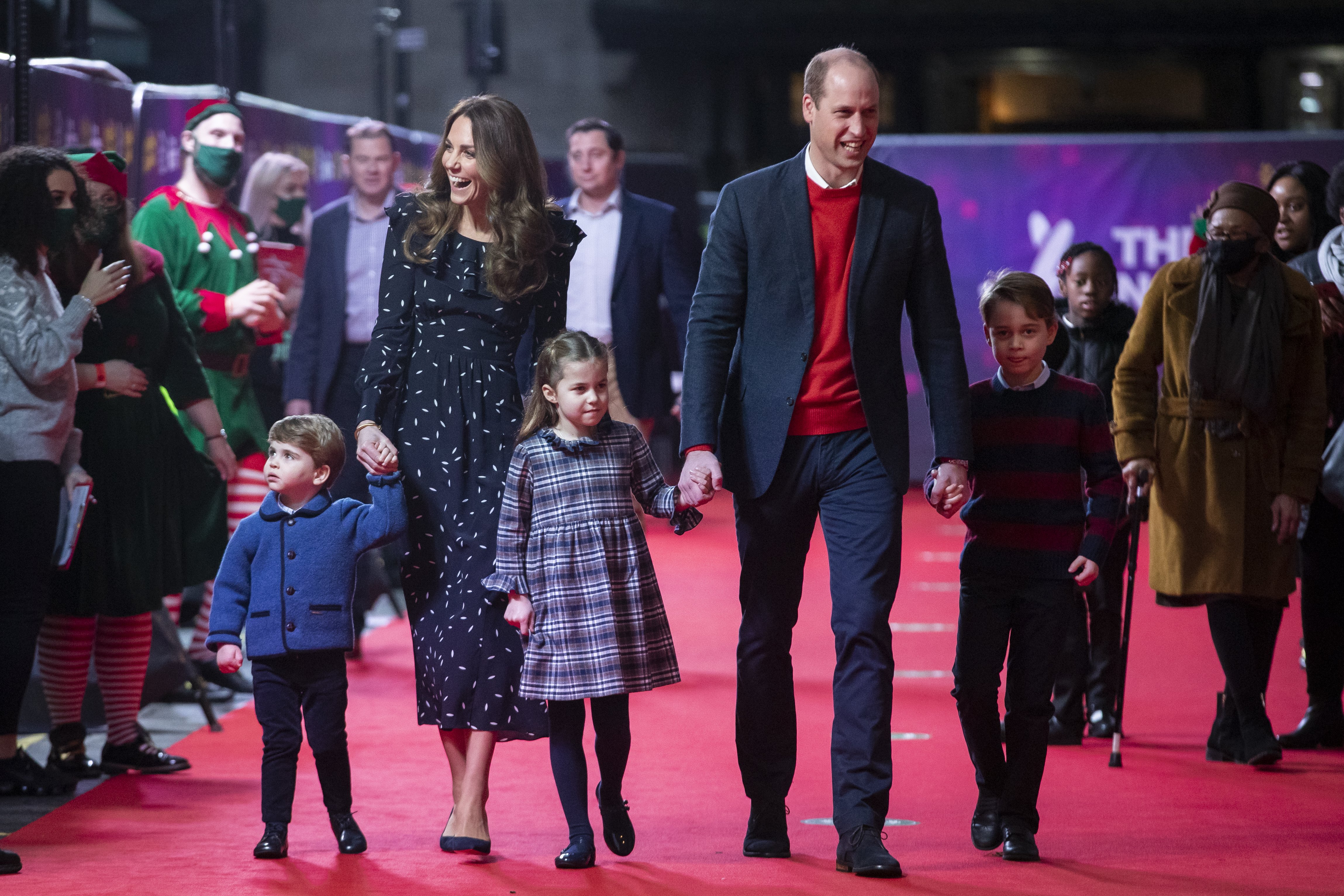 Prince William, Duke of Cambridge and Catherine, Duchess of Cambridge with their children, Prince Louis, Princess Charlotte and Prince George at a special pantomime performance at London's Palladium Theatre on December 11, 2020 in London, England. | Source: Getty Images
