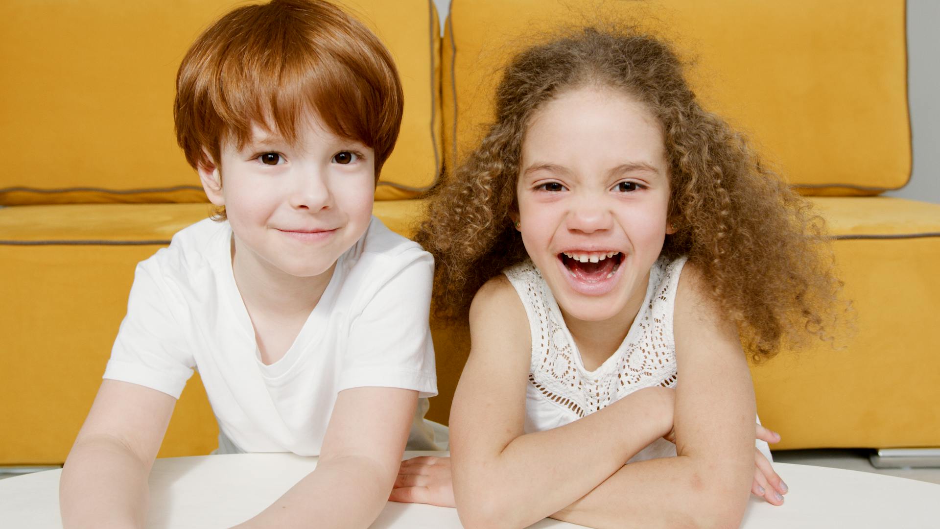 Two smiling children | Source: Pexels