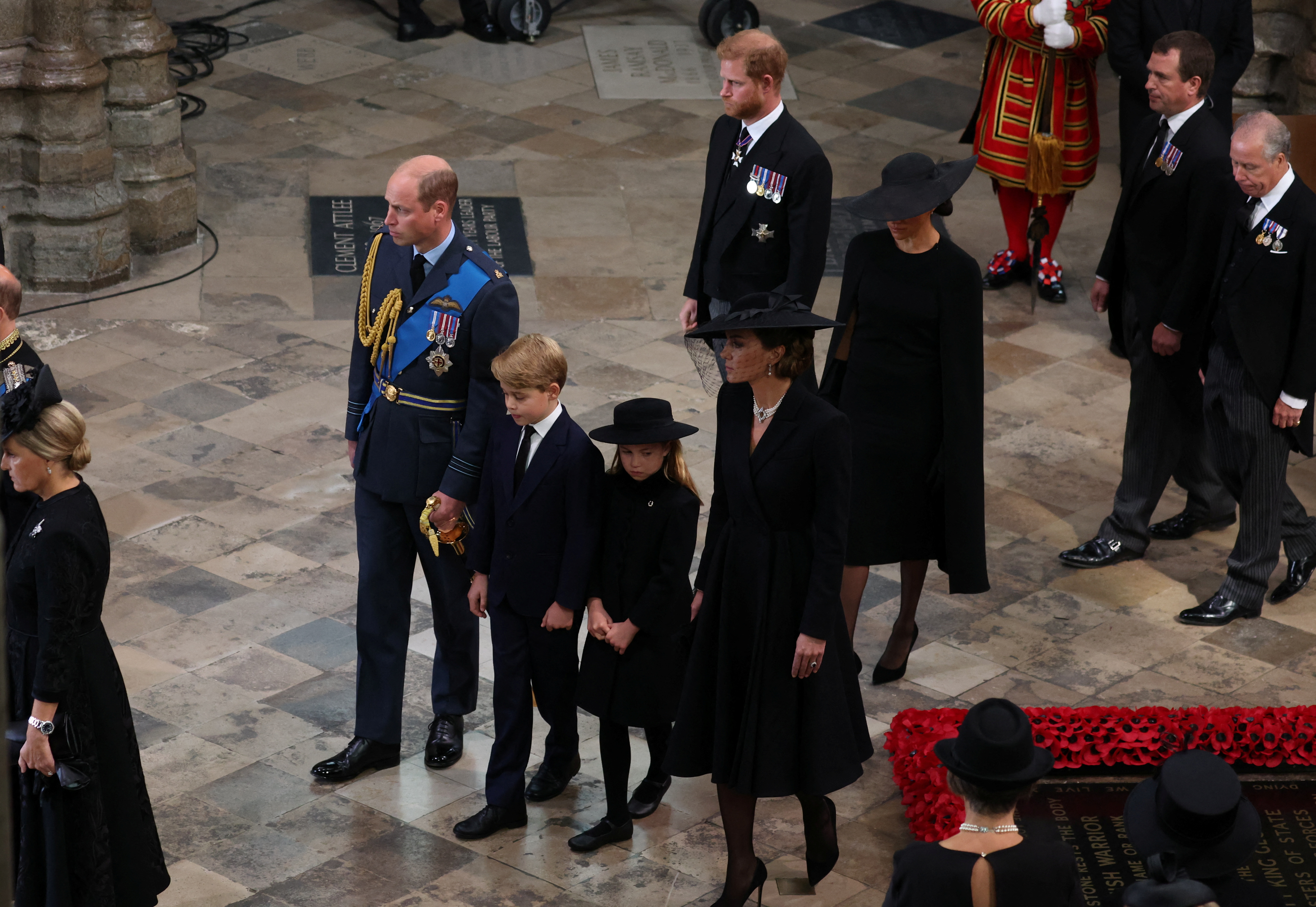 Prince William, Prince George, Princess Charlotte, Princess Catherine, Prince Harry, and Meghan Markle during the State Funeral of Queen Elizabeth II at Westminster Abbey on September 19, 2022 in London, England | Source: Getty Images