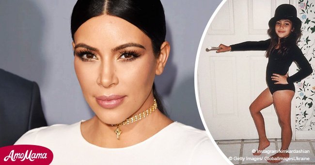 Kim Kardashian shares throwback snap that shows she's been 'posing' since childhood