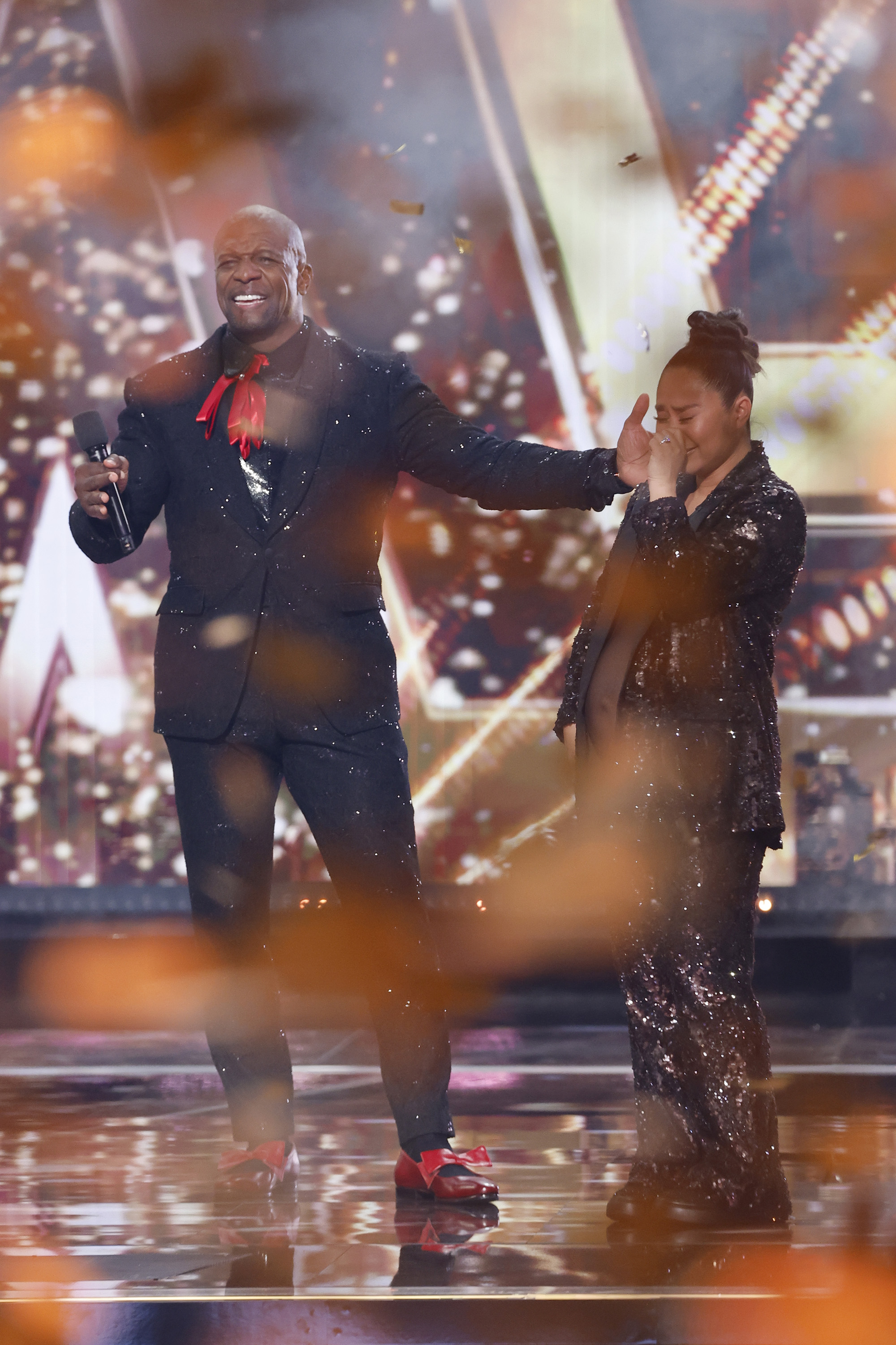 Terry Crews announces Jessica Sanchez as the winner of Season 20 during the "America's Got Talent" finale in Los Angeles on September 24, 2025 | Source: Getty Images
