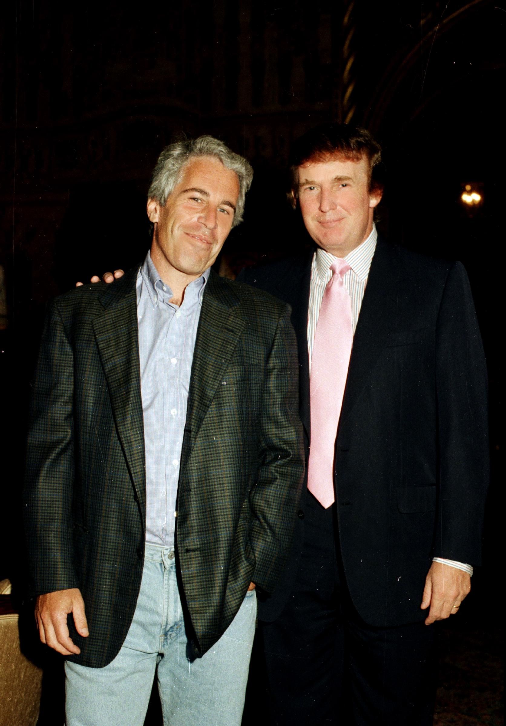 Jeffrey Epstein and Donald Trump at the Mar-a-Lago estate in Palm Beach, Florida, 1997 | Source: Getty Images