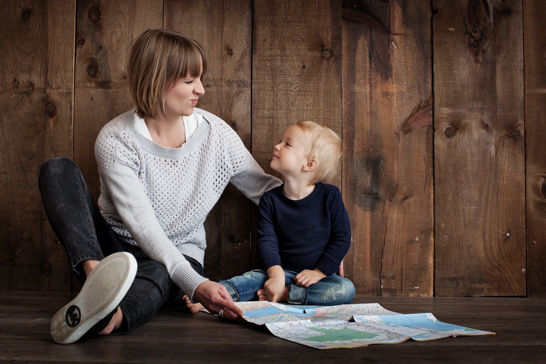 Mother and son talking and playing together | Photo: Pexel