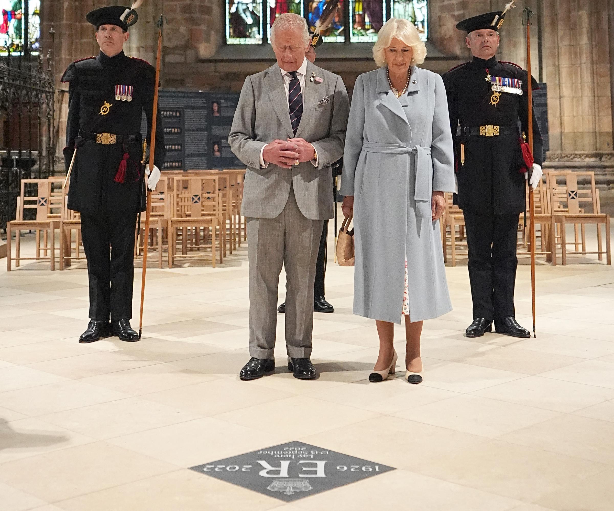 King Charles III and Queen Camilla unveil a Memorial Stone for his late mother, Queen Elizabeth II, at St Giles' Cathedral in Edinburgh, Scotland on July 2, 2025 | Source: Getty Images