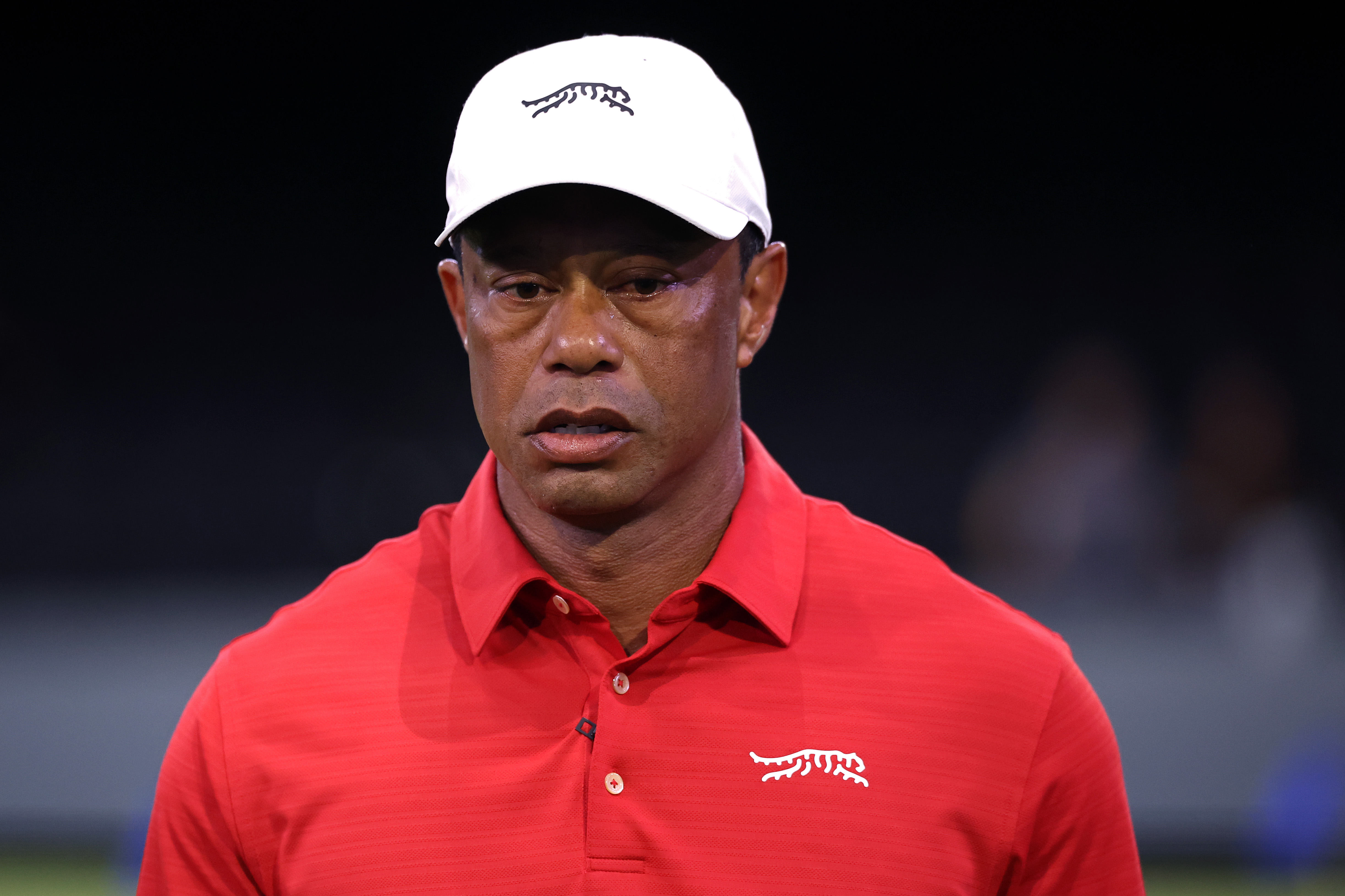 Tiger Woods looks on during a match against the Los Angeles Golf Club in Palm Beach Gardens, Florida on March 24, 2026. | Source: Getty Images