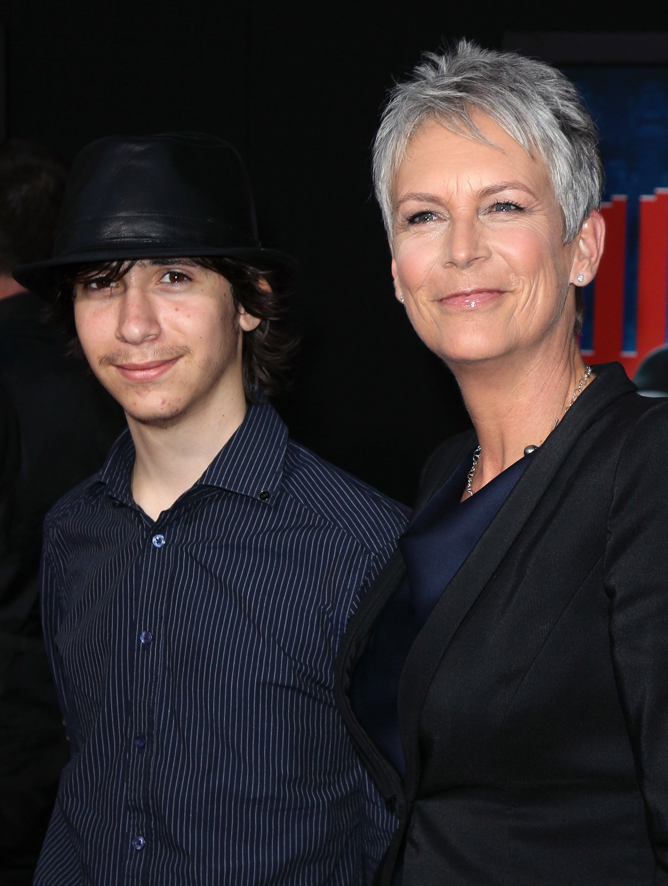 Actress Jamie Lee Curtis (R) and son Tom attend the premiere of Walt Disney Animation Studios' "Wreck-It Ralph" at the El Capitan Theatre on October 29, 2012  | Source: Getty Images
