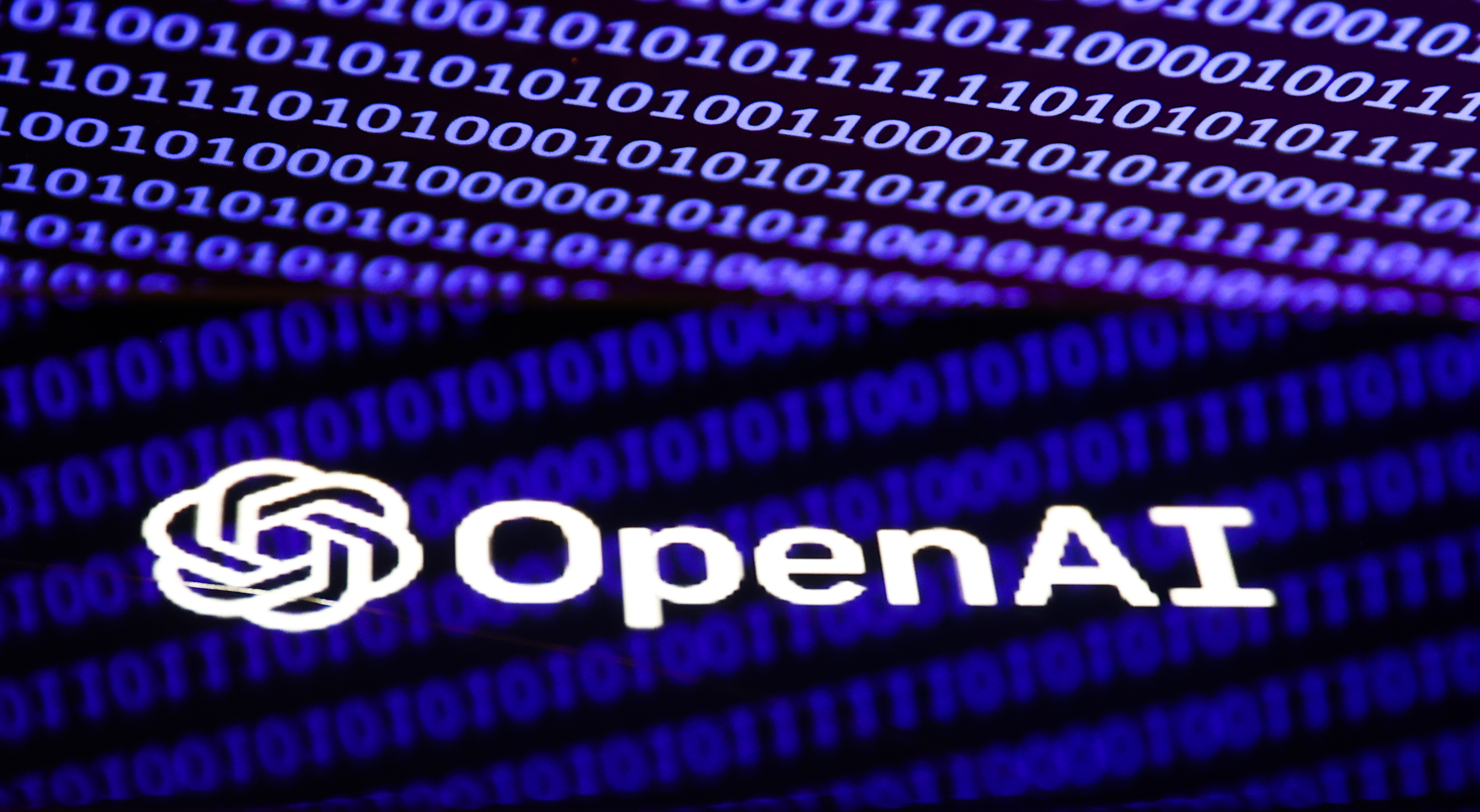 A photo of OpenAI's logo on a screen taken in Krakow, Poland on December 5, 2022 | Source: Getty Images