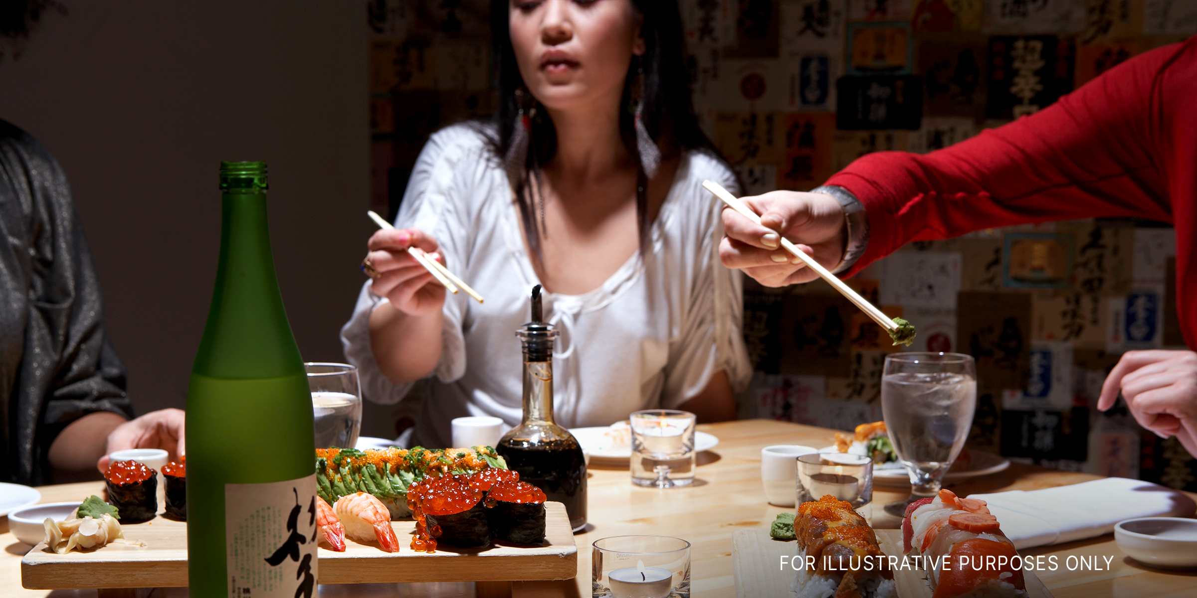 People having sushi at a restaurant | Source: Shutterstock