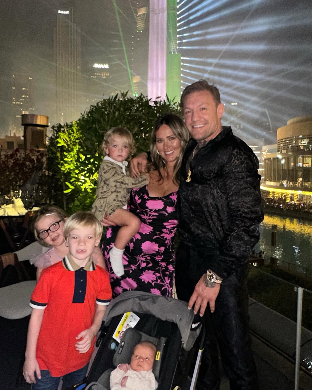 Dee Devlin and Conor McGregor with their children from a post dated January 1, 2024. | Source: Instagram/thenotoriousmma