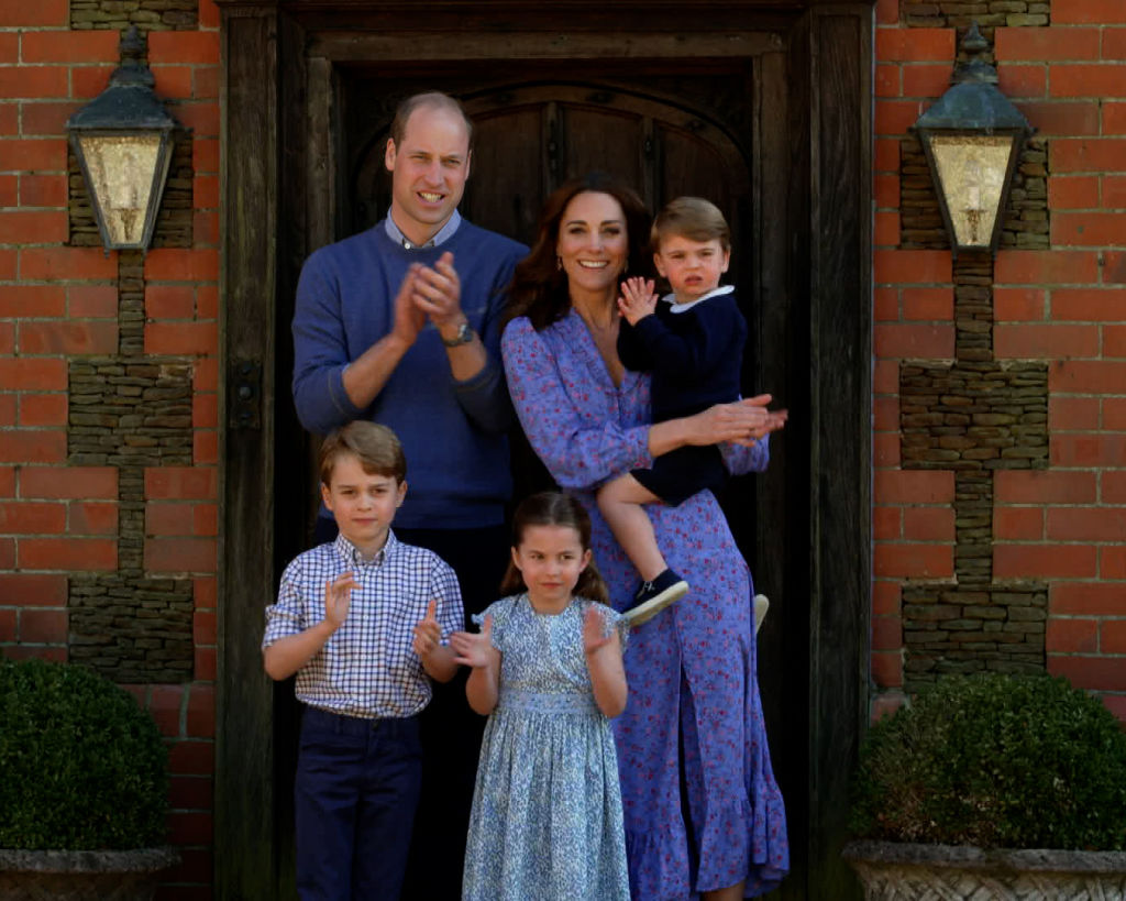 Prince William, Duke of Cambridge, Catherine Duchess of Cambridge, Prince George of Cambridge, Princess Charlotte of Cambridge and Prince Louis of Cambridge clap for NHS carers on April 23, 2020, in London, England | Source: Getty Images