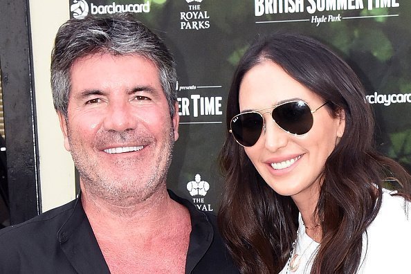 Simon Cowell and Lauren Silverman at Hyde Park on July 6, 2018 in London, England | Photo: Getty Images