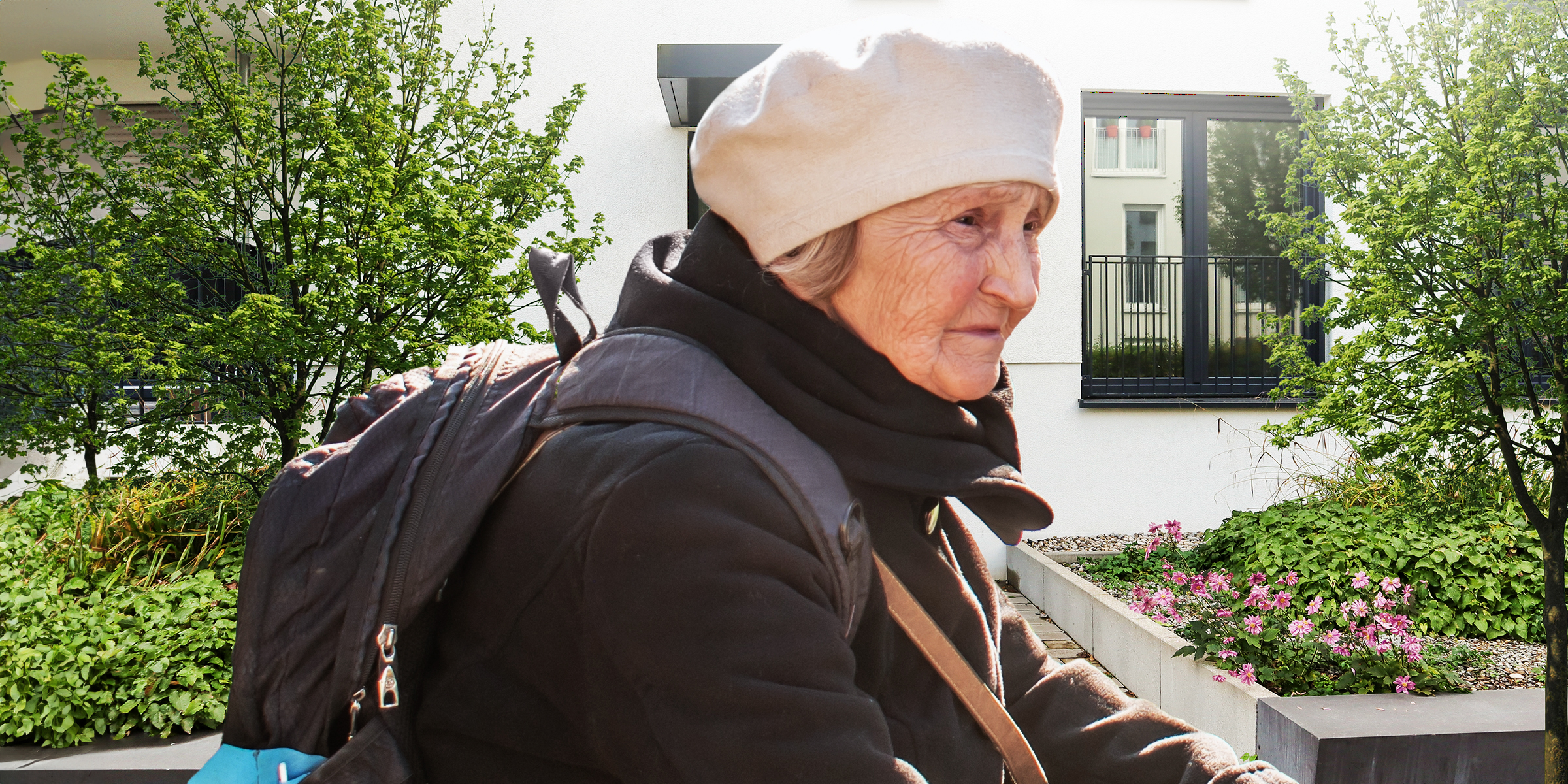 A distraught-looking elderly woman walking with a backpack | Source: Shutterstock