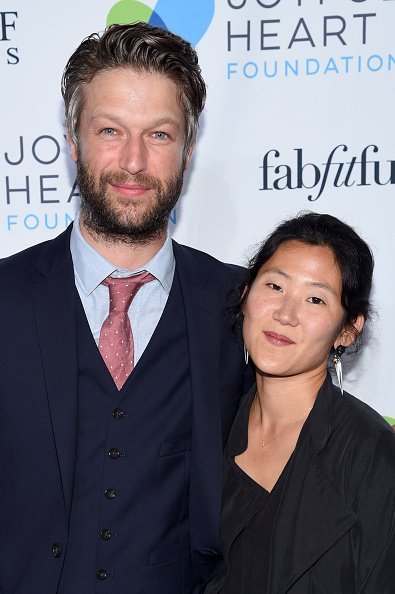 Peter Scanavino and Lisha Bai at The Joyful Revolution Gala In New York City on May 22, 2017 in New York City. | Photo: Getty Images