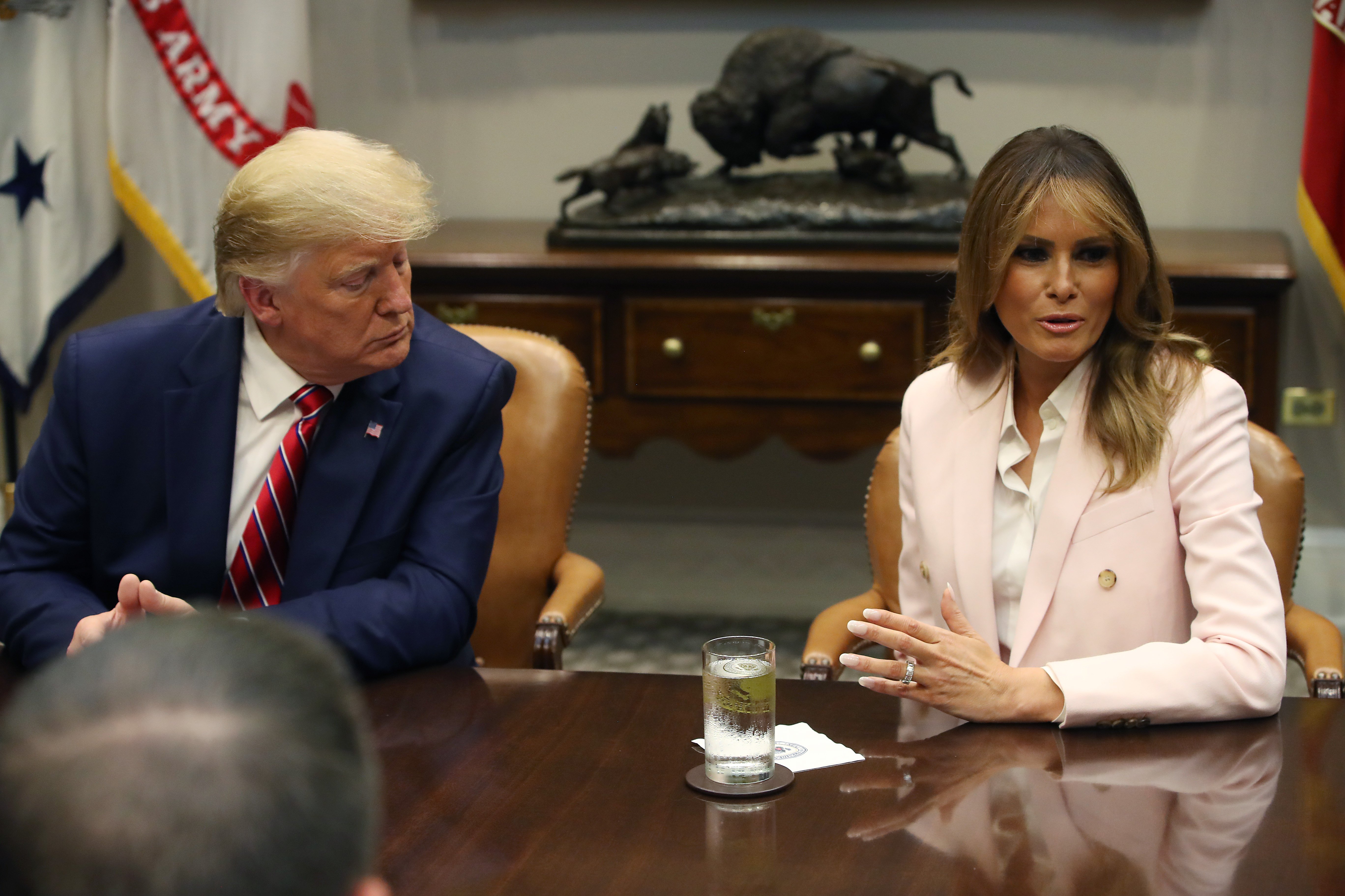 Donald and Melania Trump during a roundtable discussion on the efforts to combat the opioid epidemic, in the Roosevelt Room | Photo: Getty Images