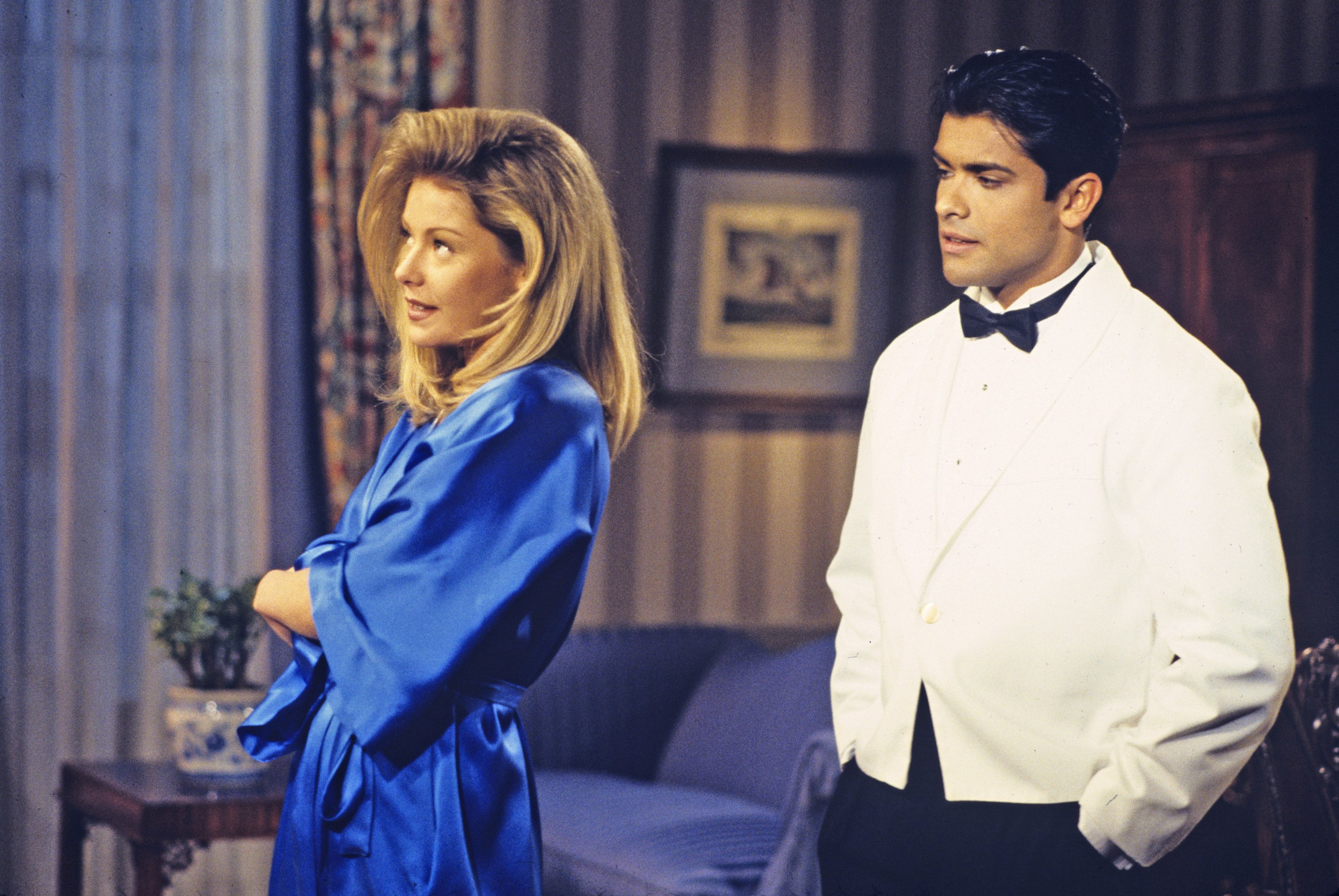 Kelly Ripa (Hayley) and Mark Consuelos (Mateo) in a scene on Walt Disney Television via Getty Images Daytime's "All My Children", in 1995. | Source: Getty Images