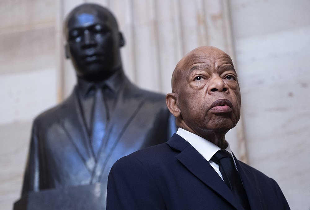 John Lewis, D-Ga., is seen near the statue of Dr. Martin Luther King, Jr., in the Capitol Rotunda before a memorial service for the late Rep. Elijah Cummings, D-Md., in Statuary Hall on Thursday, October 24, 2019. I Image: Getty Images.
