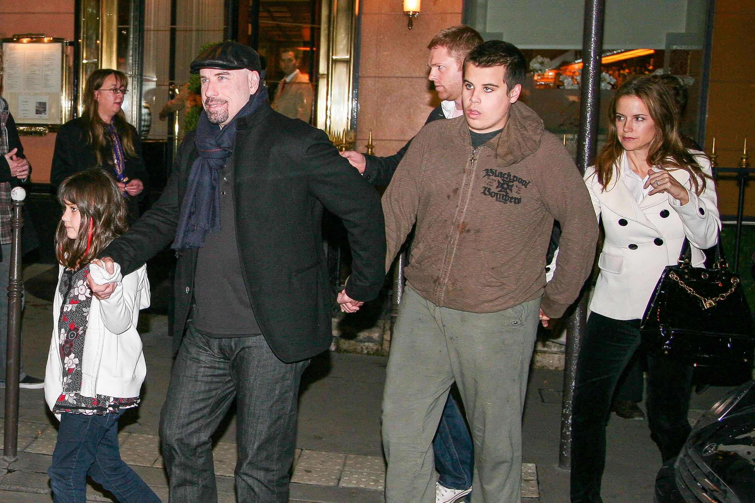John Travolta seen leaving a restaurant with his children, daughter Ella Bleu and son Jett Travolta, as well as his wife, Kelly Preston, on November 3, 2008, in Paris, France. | Source: Getty Images