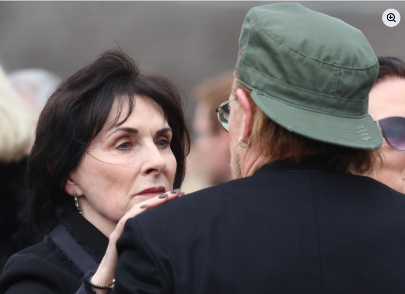 Enya and Bono appeared in conversation during the emotional gathering, offering support as mourners paid their respects at Moya Brennan's funeral. | Source: Facebook/Irish Daily Mirror
