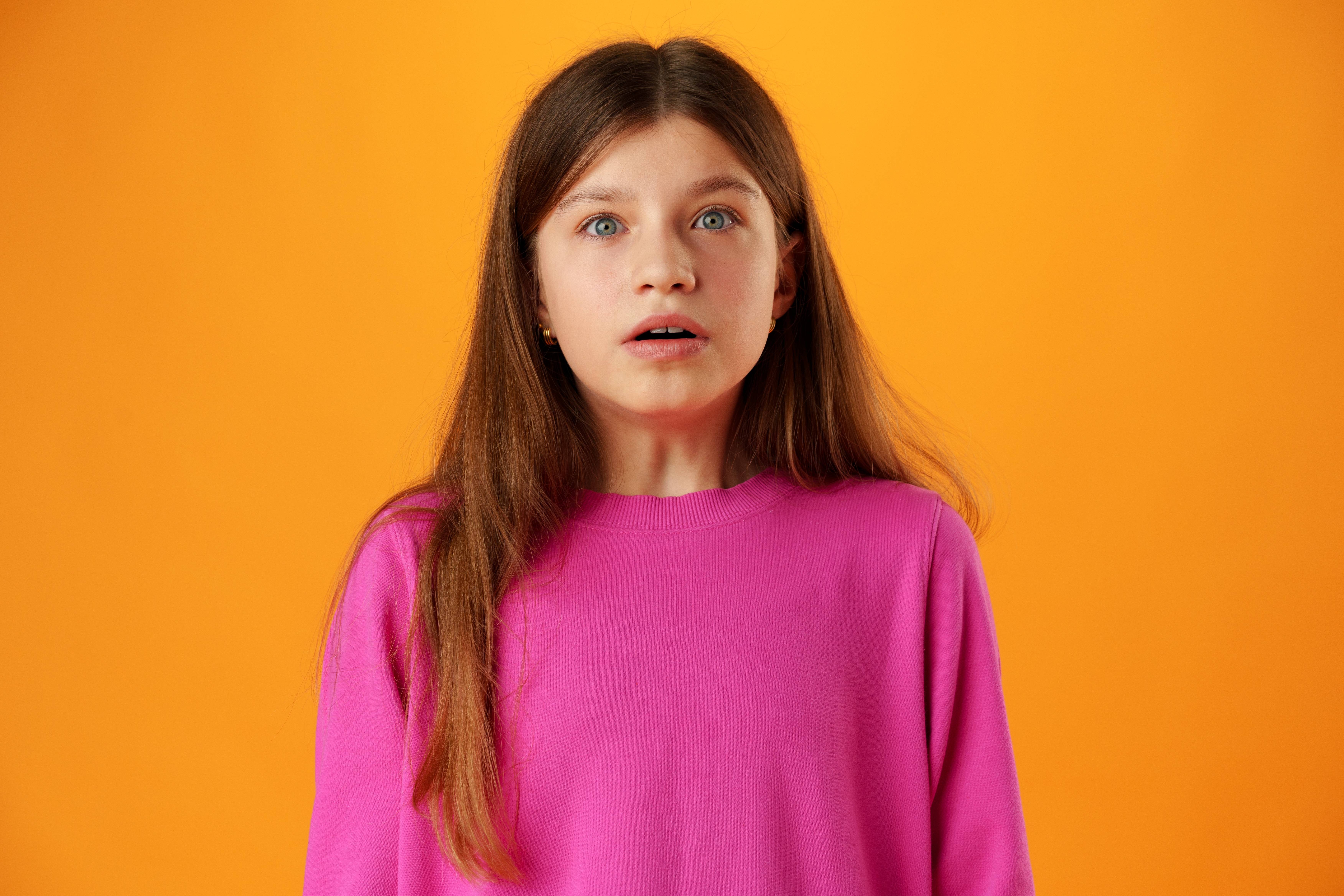 A shocked teen girl | Shutterstock
