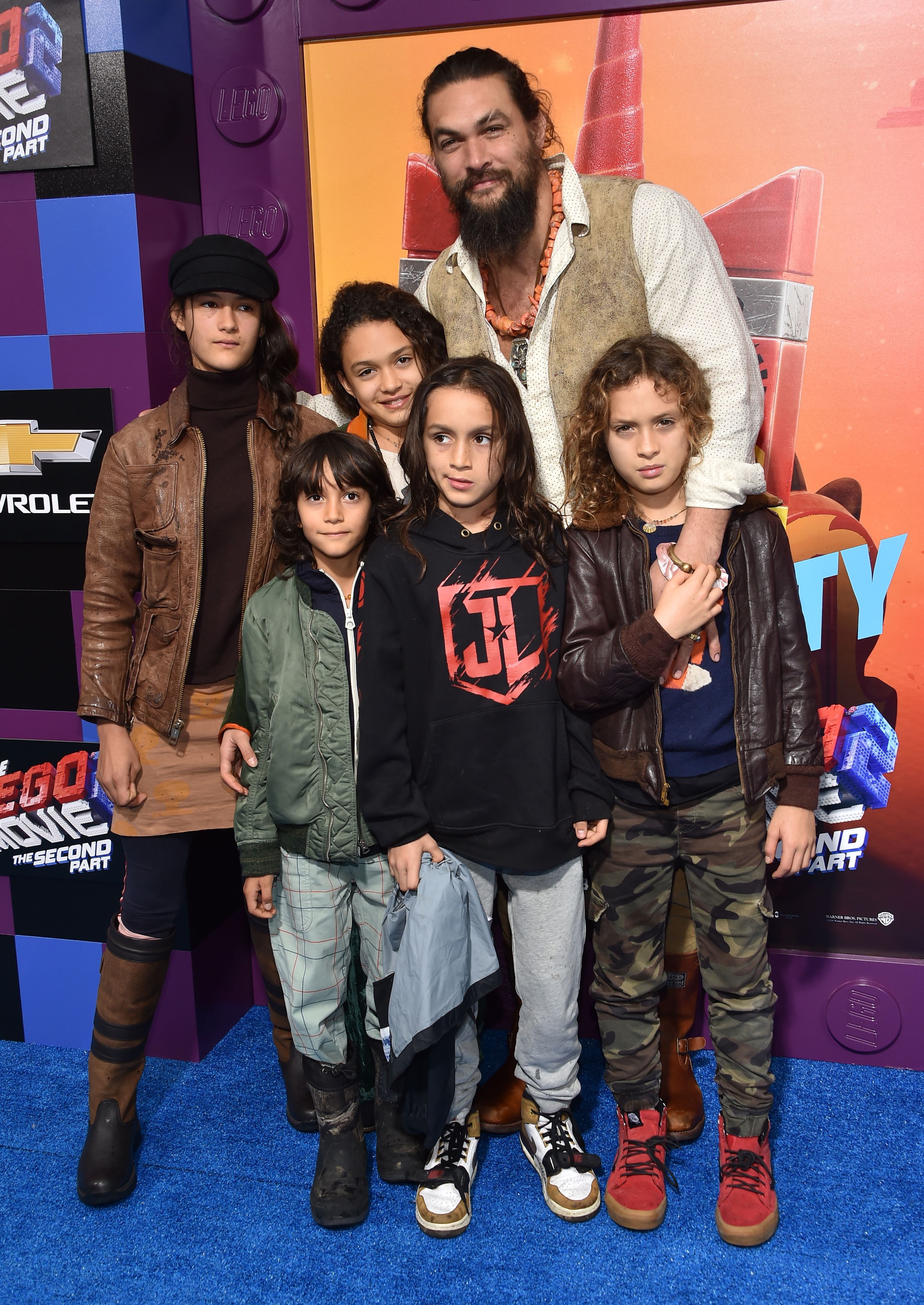Jason Momoa brought Lola Iolani and Nakoa-Wolf Momoa to the premiere of "The Lego Movie 2: The Second Part," where the blue carpet turned into a relaxed family moment with friends. Their playful energy stood out in the crowd.