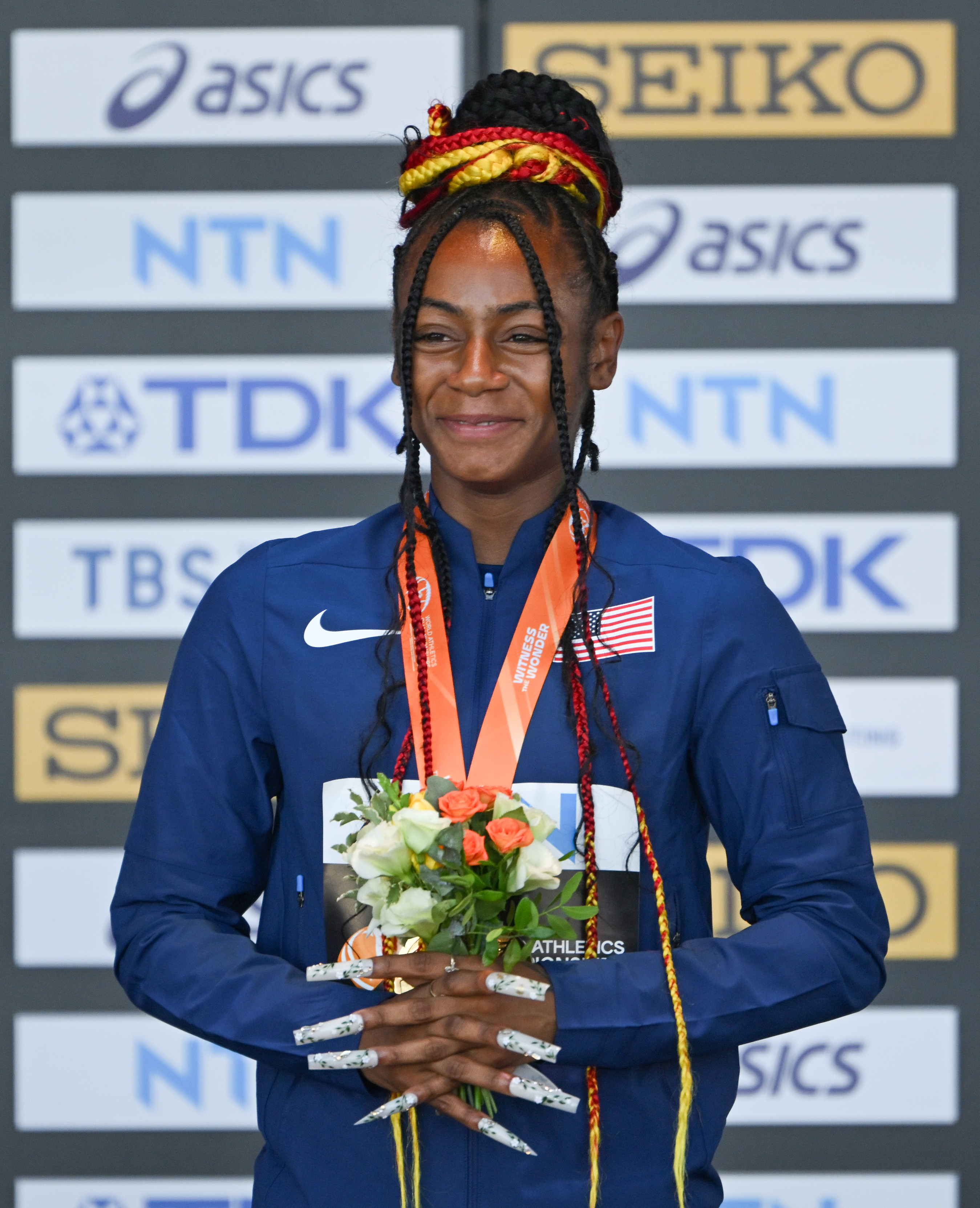 Sha'Carri Richardson during the medal ceremony for the Women's 100m at the World Athletics Championships Budapest 2023 on August 22, 2023, in Budapest, Hungary. | Source: Getty Images