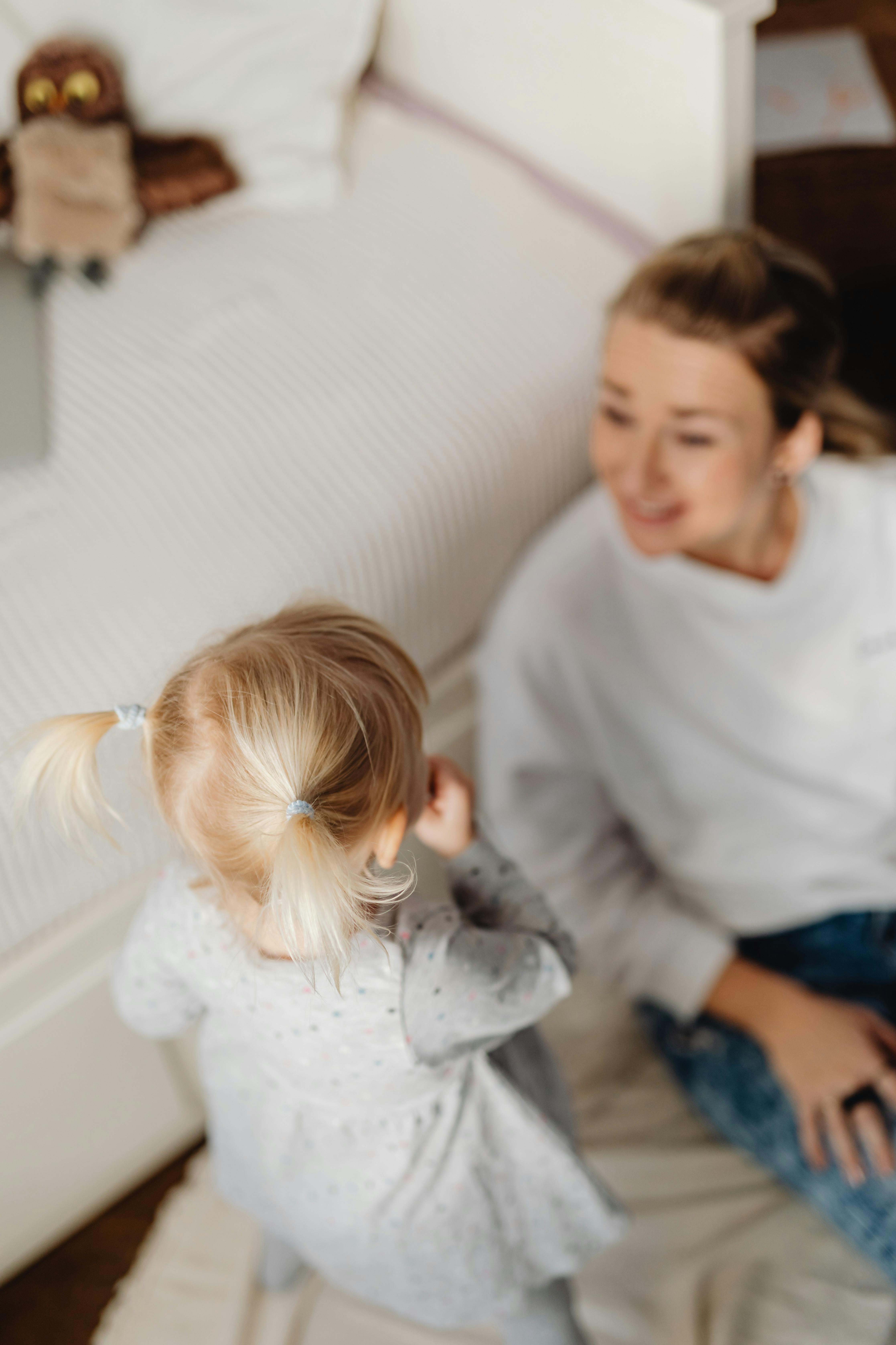 A woman talking to a toddler | Source: Pexels