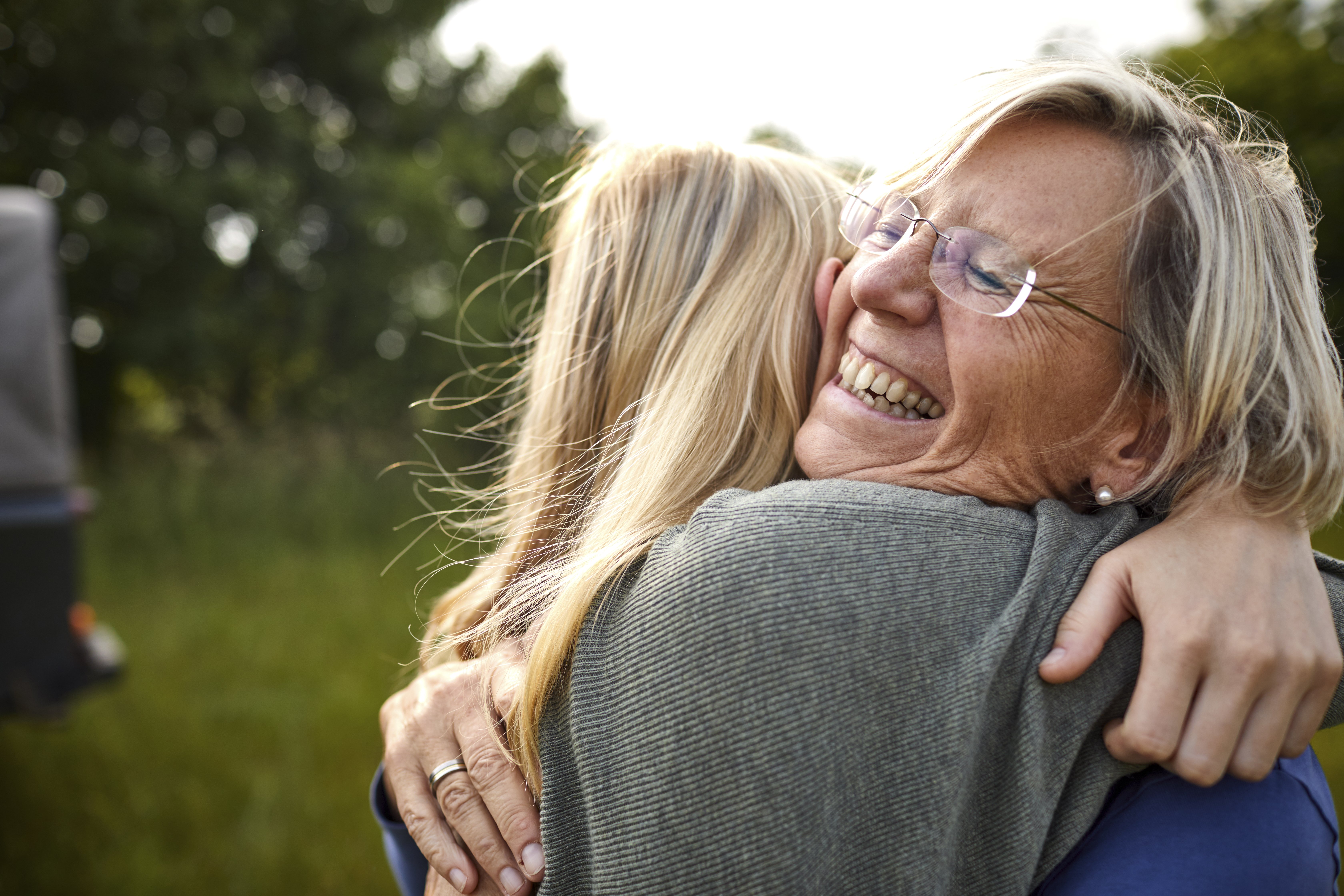 Jane is reunited with her daughter, Monica, at the local police station. | Source: Getty Images