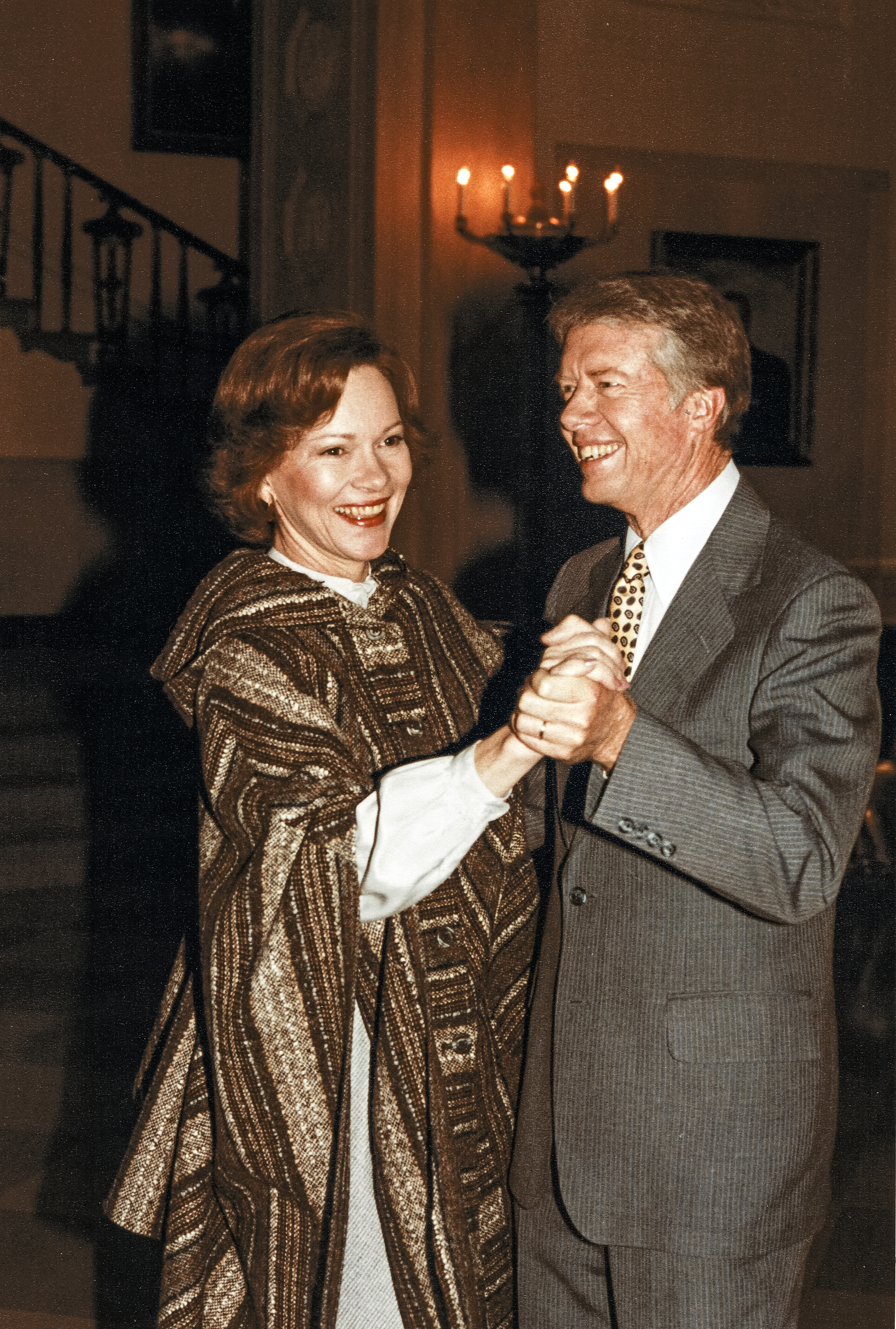 Rosalynn and Jimmy Carter smile as they dance together in the grand foyer of the White House, in Washington D.C., on January 31, 1979 | Source: Getty Images