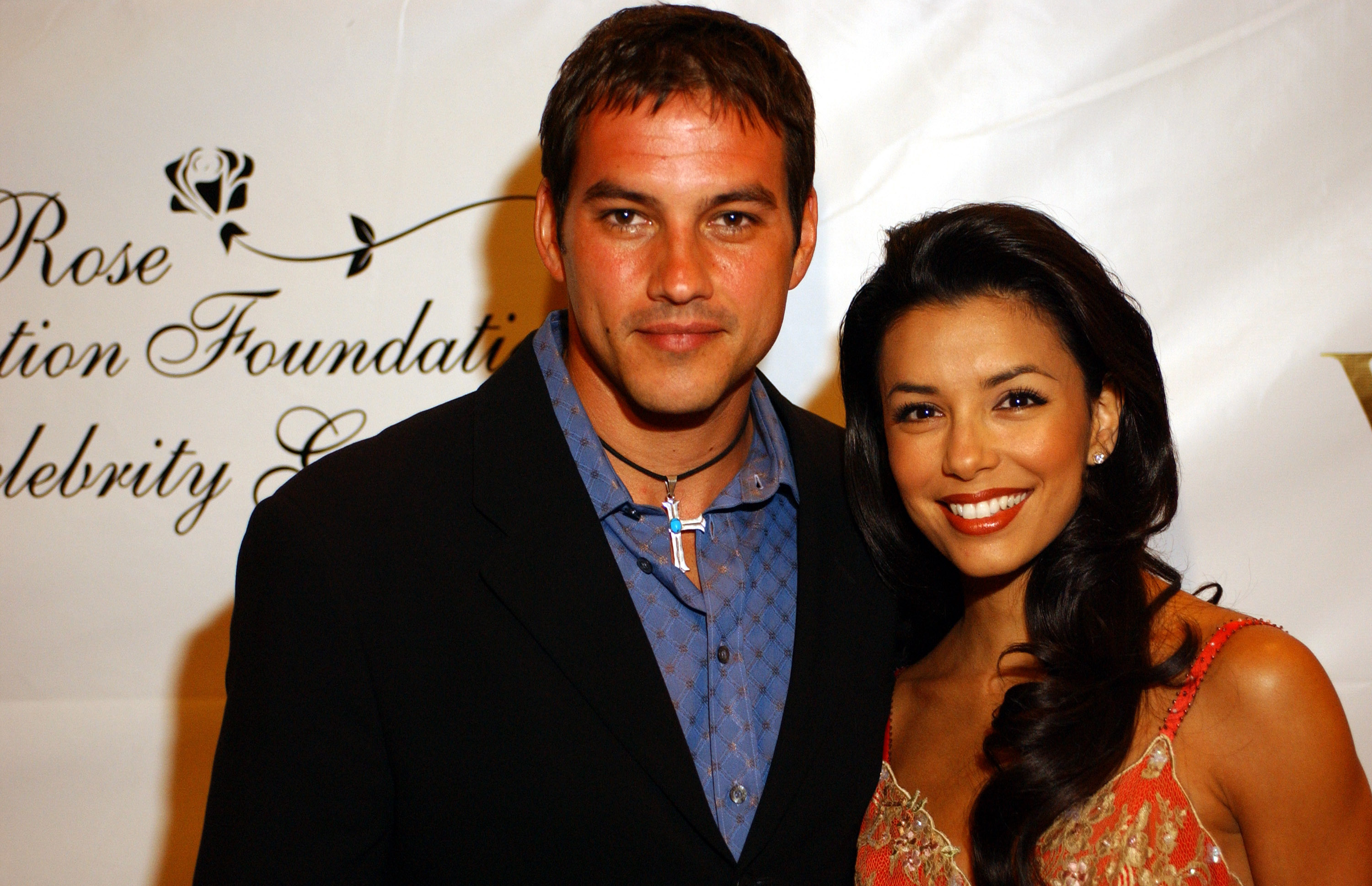 Tyler Christopher and Eva Longoria at The Rose Education Foundation's second annual gala on June 28, 2003 | Source: Getty Images