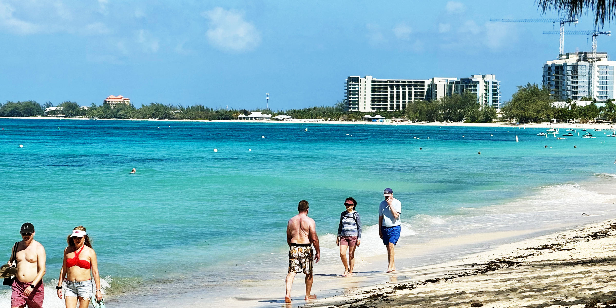 Tourists enjoying the Cayman Islands | Source: Getty Images