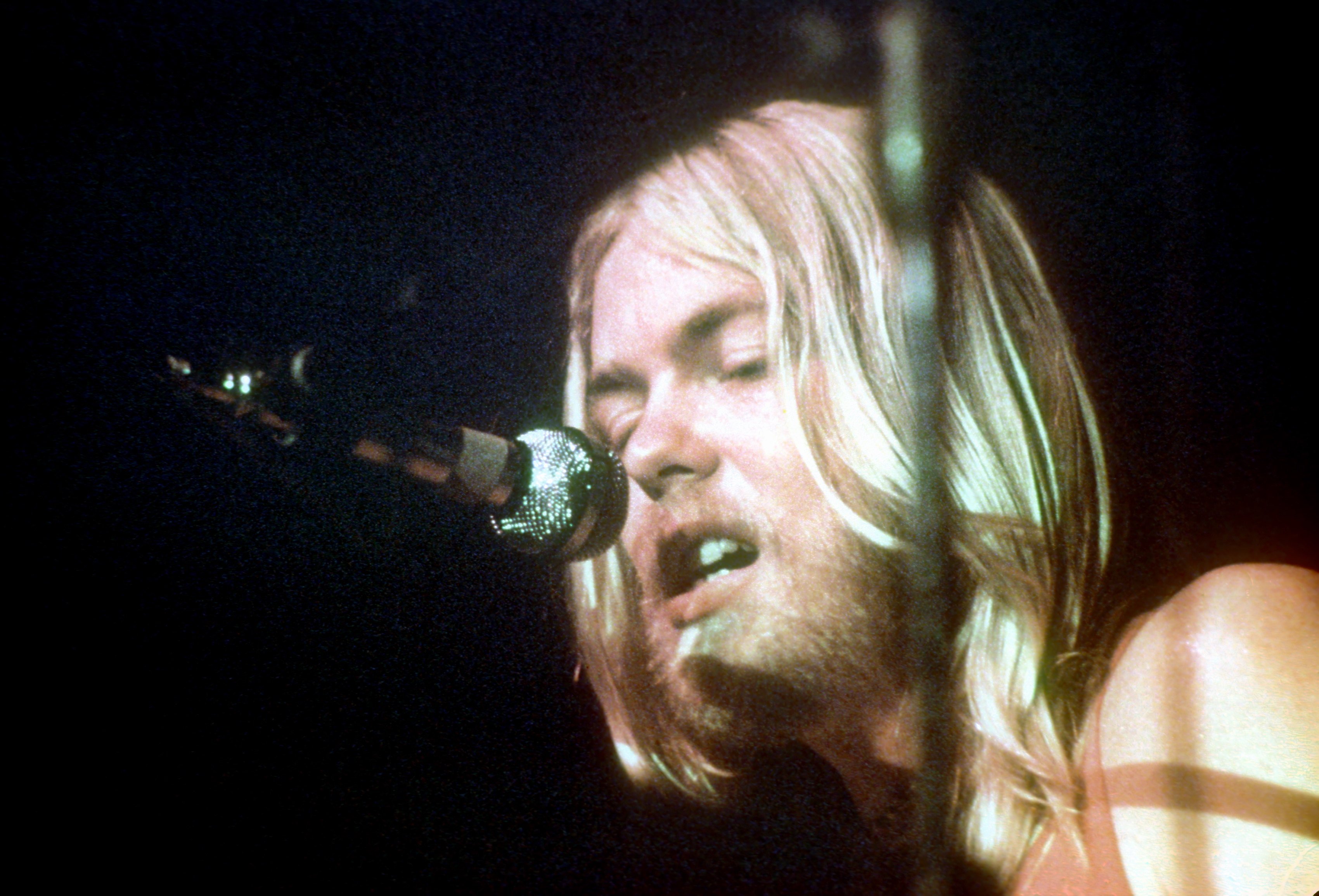 Gregg Allman pictured performing at an unspecified event on September 1, 1972. | Source: Getty Images