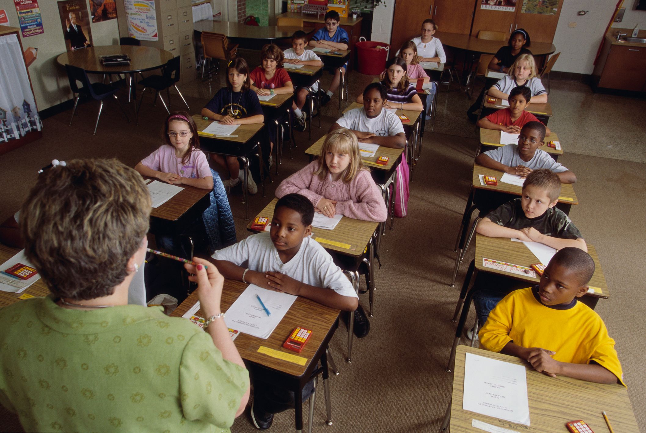 Teacher Going over Exam Instructions | Getty Images