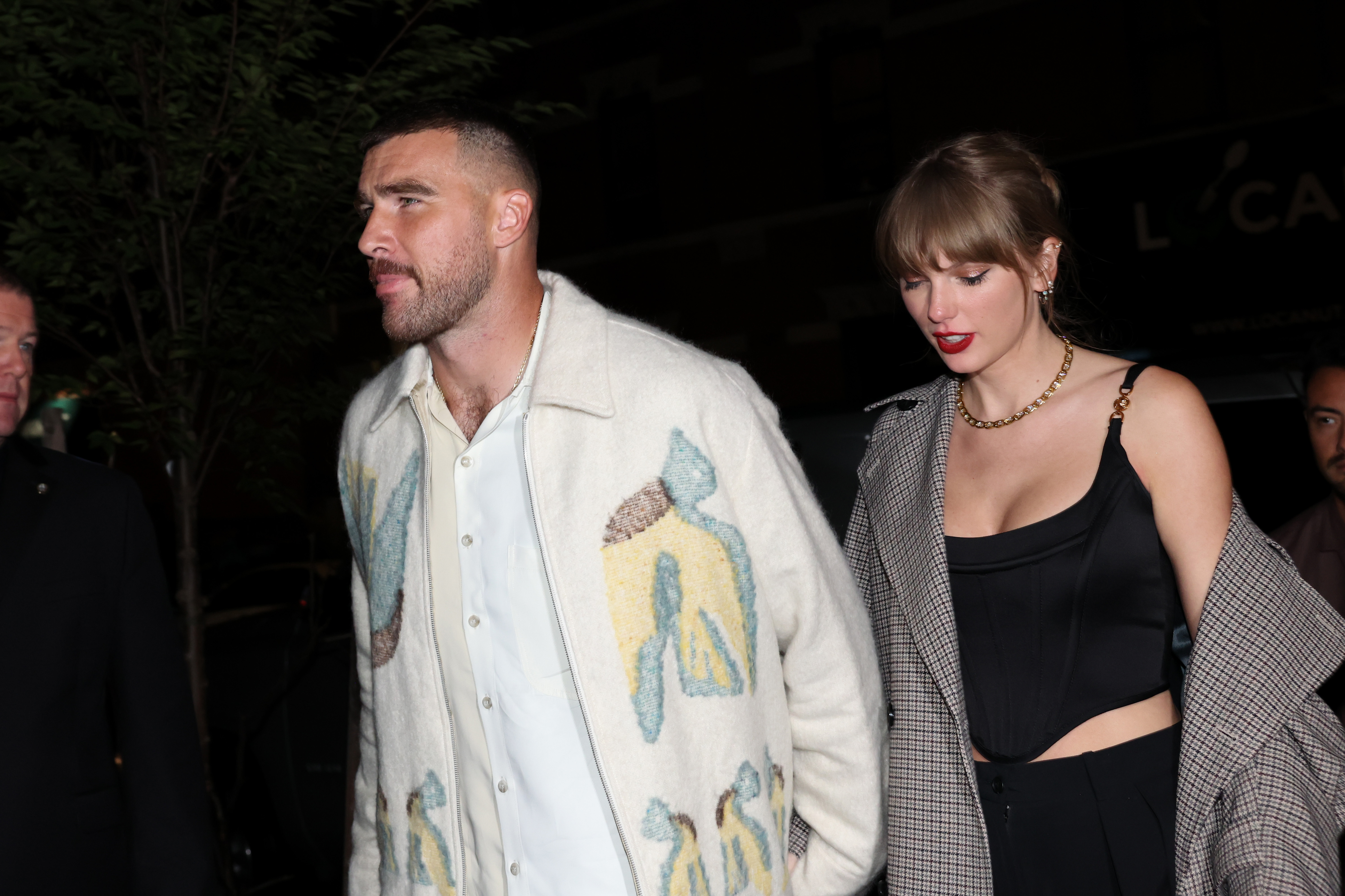 Travis Kelce and Taylor Swift spotted at the "SNL" season premiere party on October 14, 2023, in New York. | Source: Getty Images