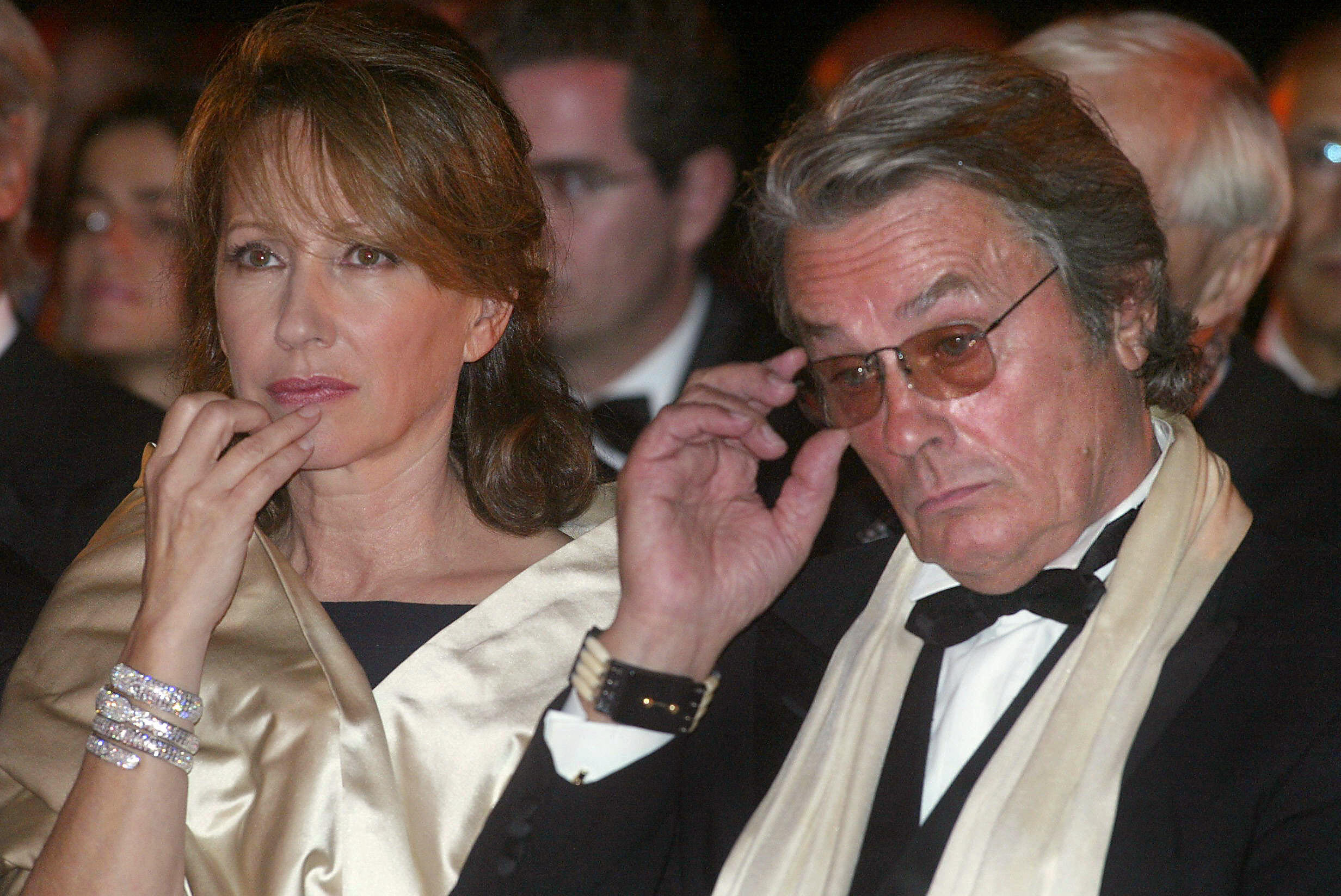 Nathalie and Alain Delon at a ceremony in honor of French producer Daniel Toscan du Plantier during the third Marrakech Film Festival on October 4, 2003, in Morocco. | Source: Getty Images