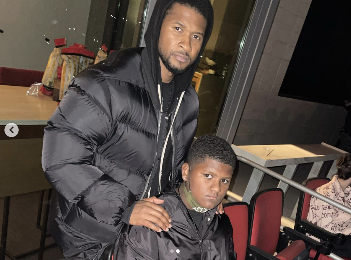 Usher with his son, Naviyd Ely, as seen in a post dated December 11, 2021 | Source: Instagram/usher