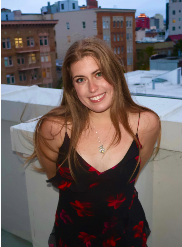 Danilee Norris smiles against a cityscape backdrop, marking her birthday with effortless charm and a playful, take-it-in-stride spirit. | Source: Instagram/d.ani.lee