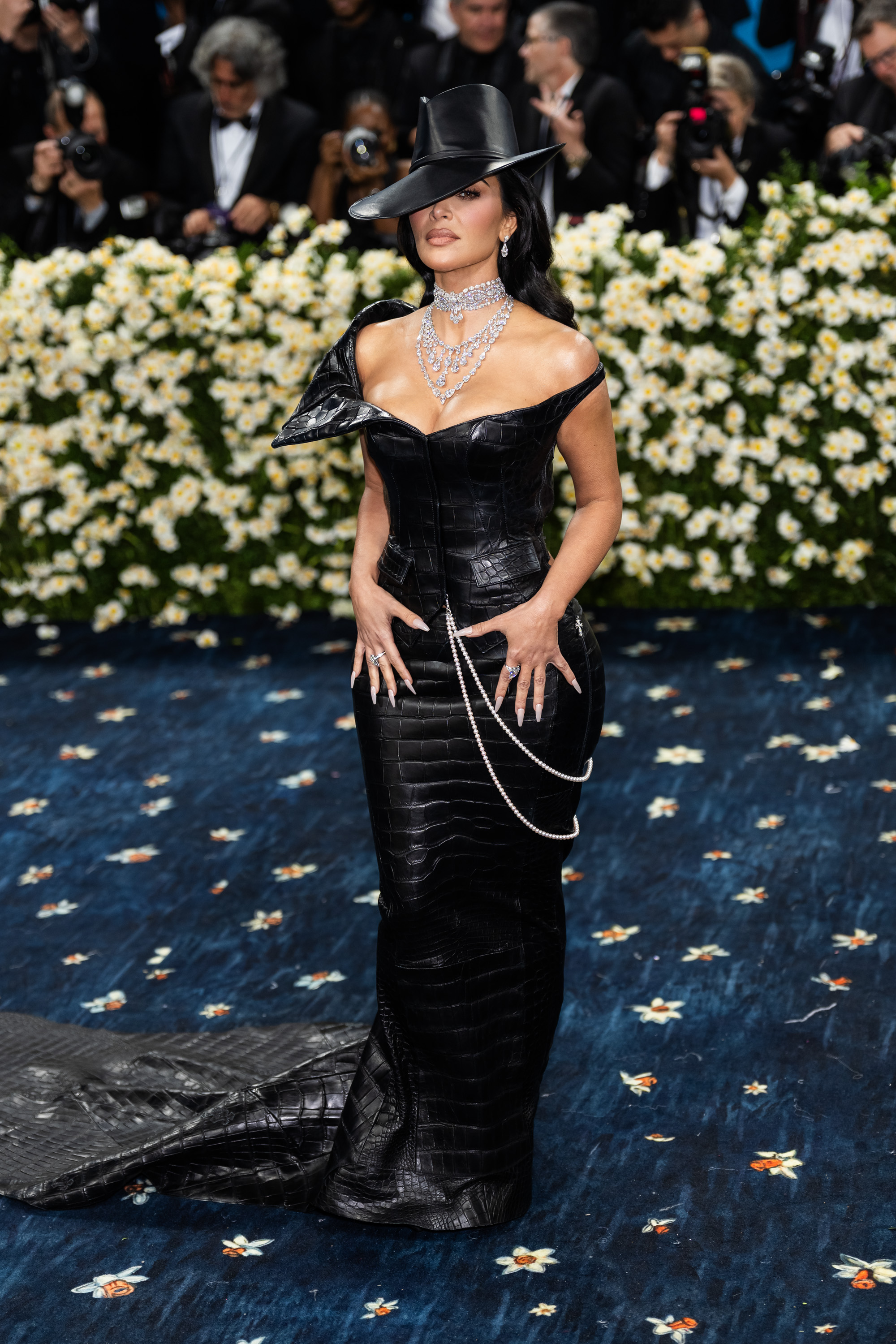Kim Kardashian posing for photos. | Source: Getty Images