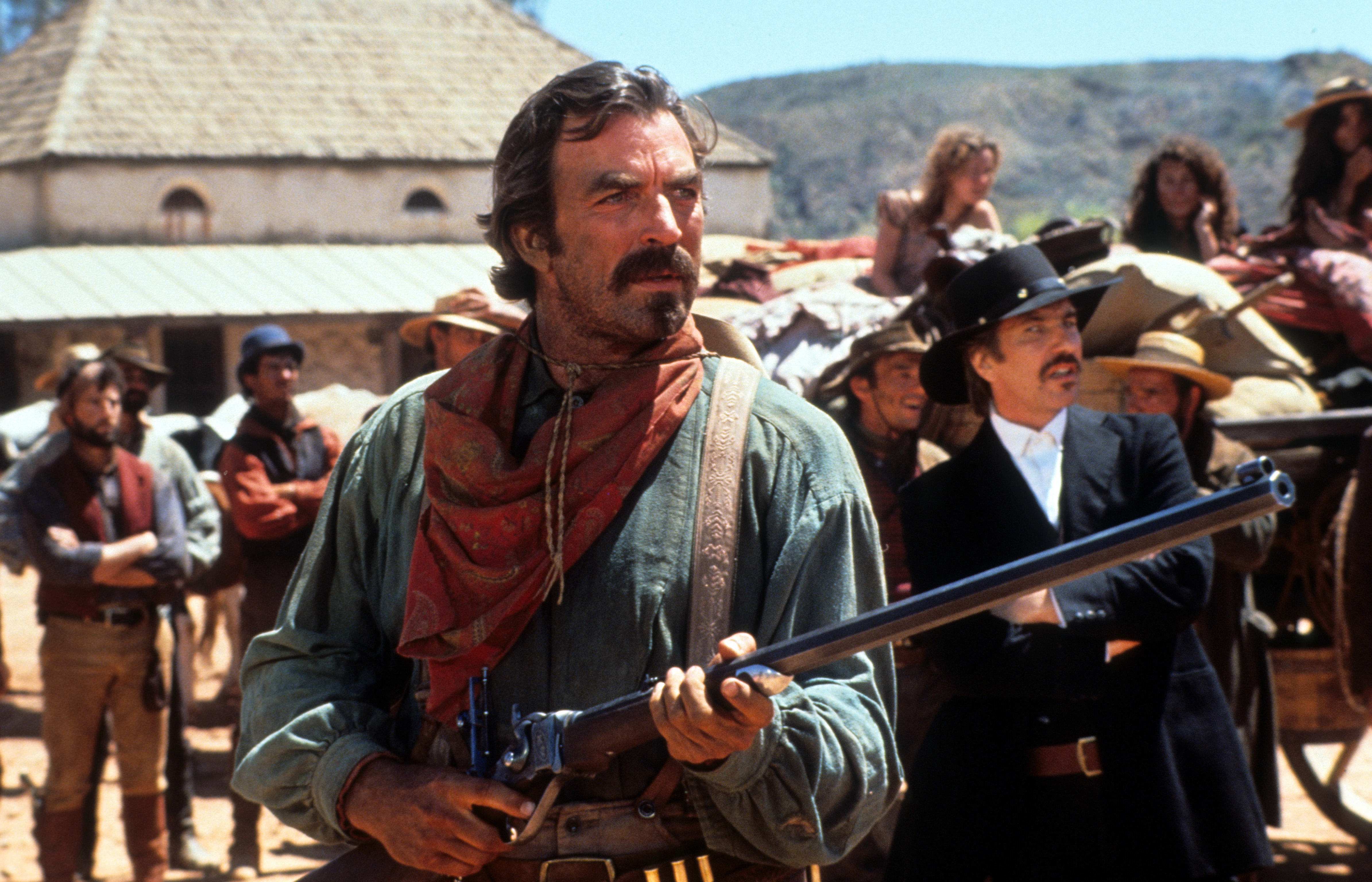 Tom Selleck holds a rifle in a scene from the film "Quigley Down Under" in 1990 | Source: Getty Images