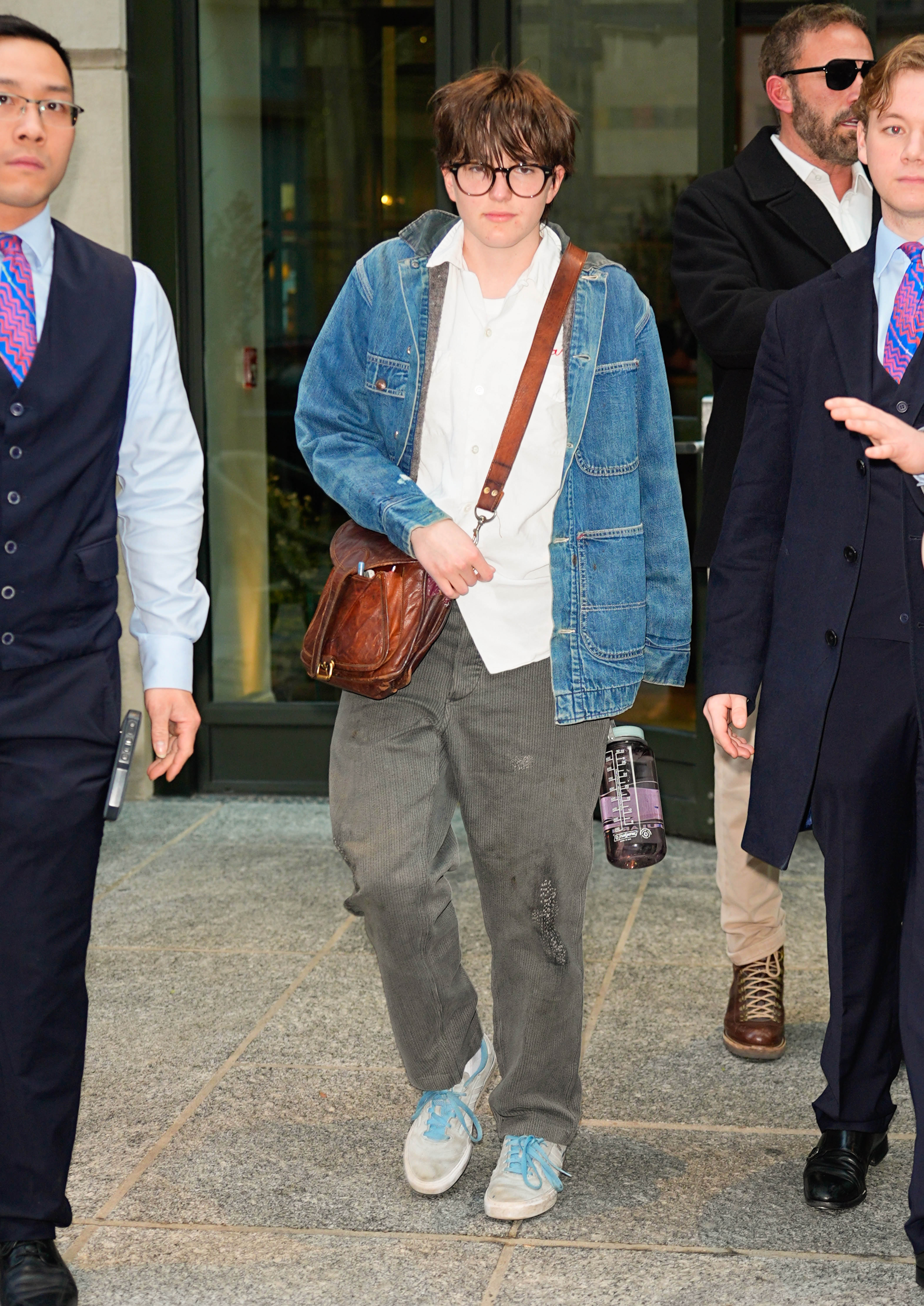 Another image from the same outing captured Fin walking ahead while carrying the brown leather crossbody bag. The appearance continued a pattern of everyday public outings rather than high-profile appearances. | Source: Getty Images