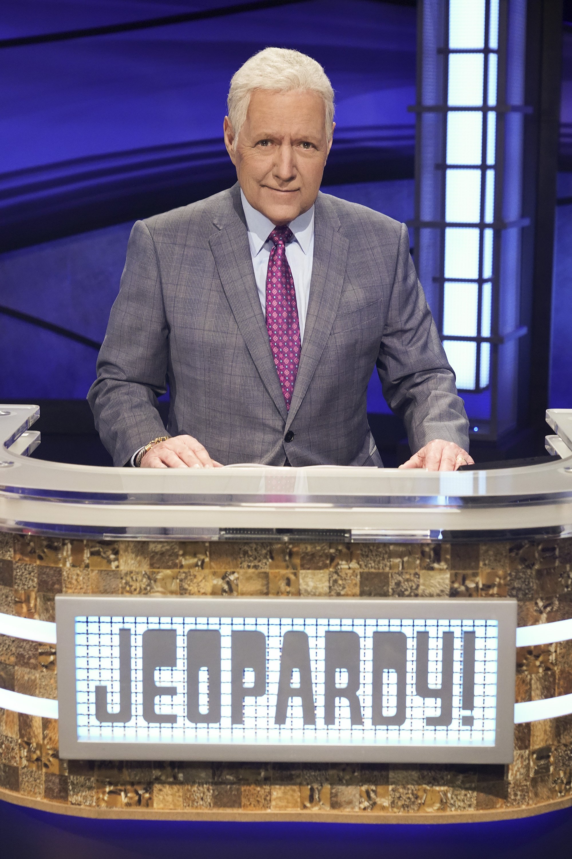 Alex Trebek pictured behind the "Jeopardy!" lectern on an episode of the show. | Photo: Getty Images