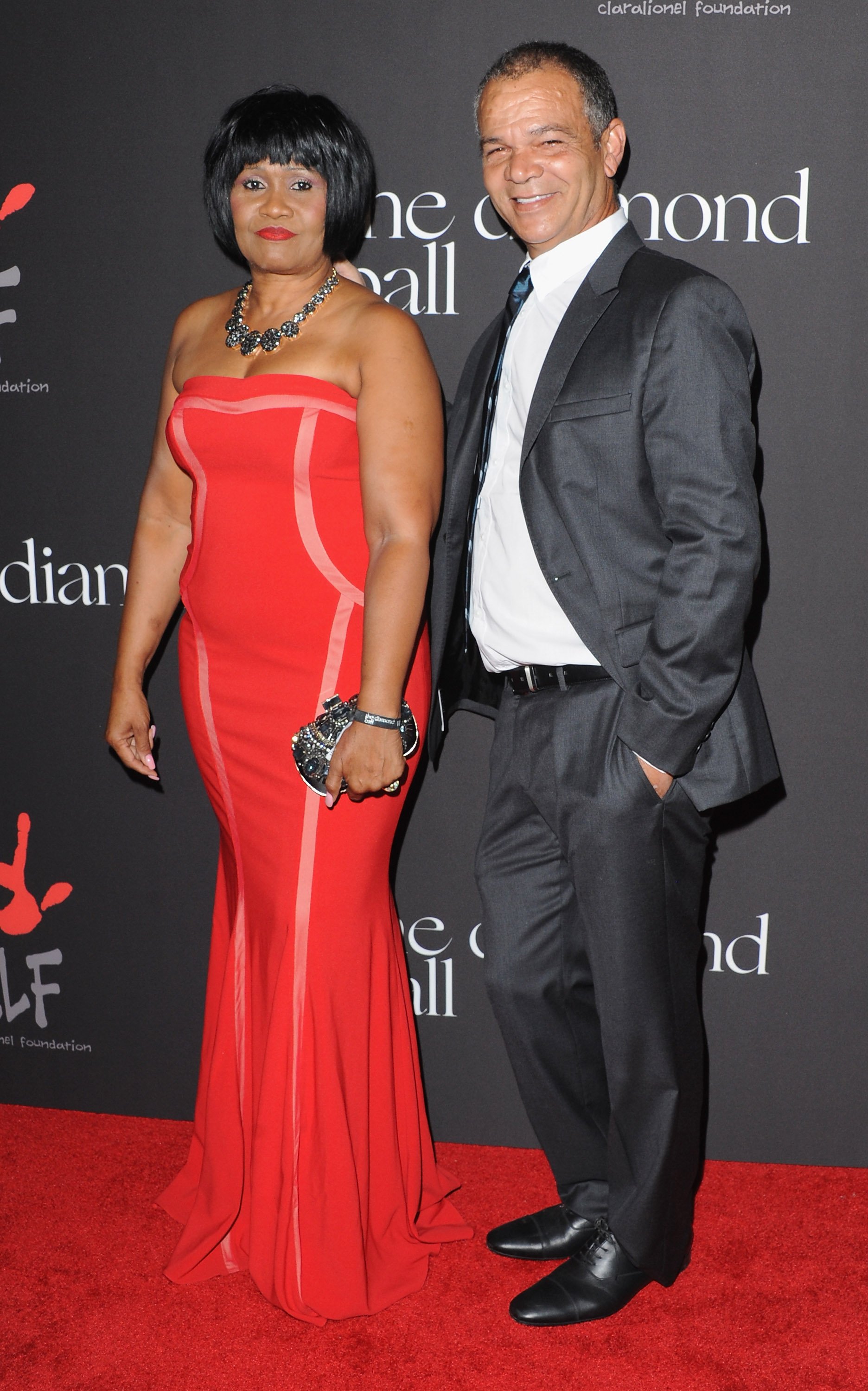 Rihanna's parents Monica Braithwaite and Ronald Fenty at her first Annual Diamond Ball on December 11, 2014, in California. | Source: Getty Images
