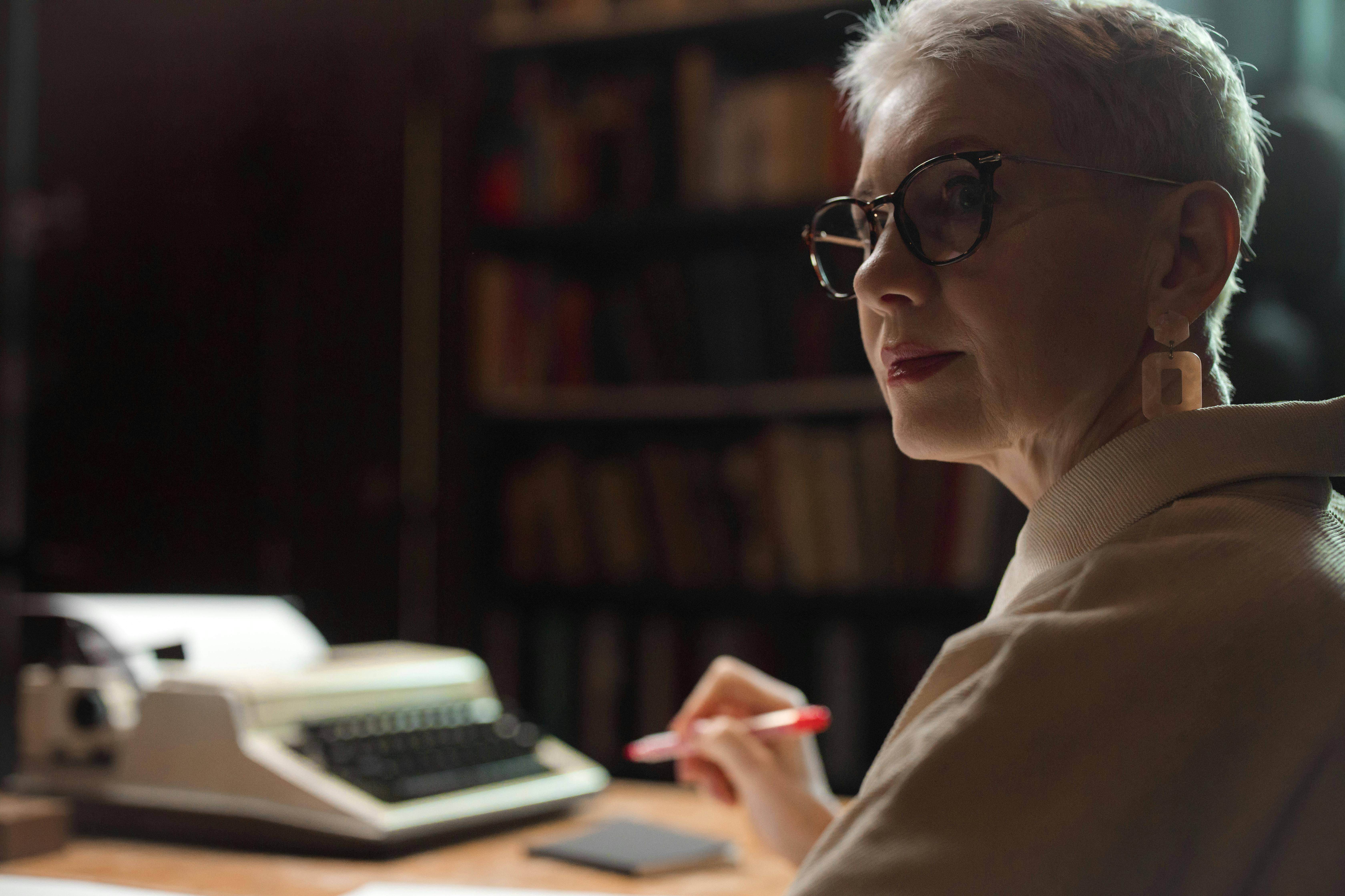 A woman journaling | Source: Pexels