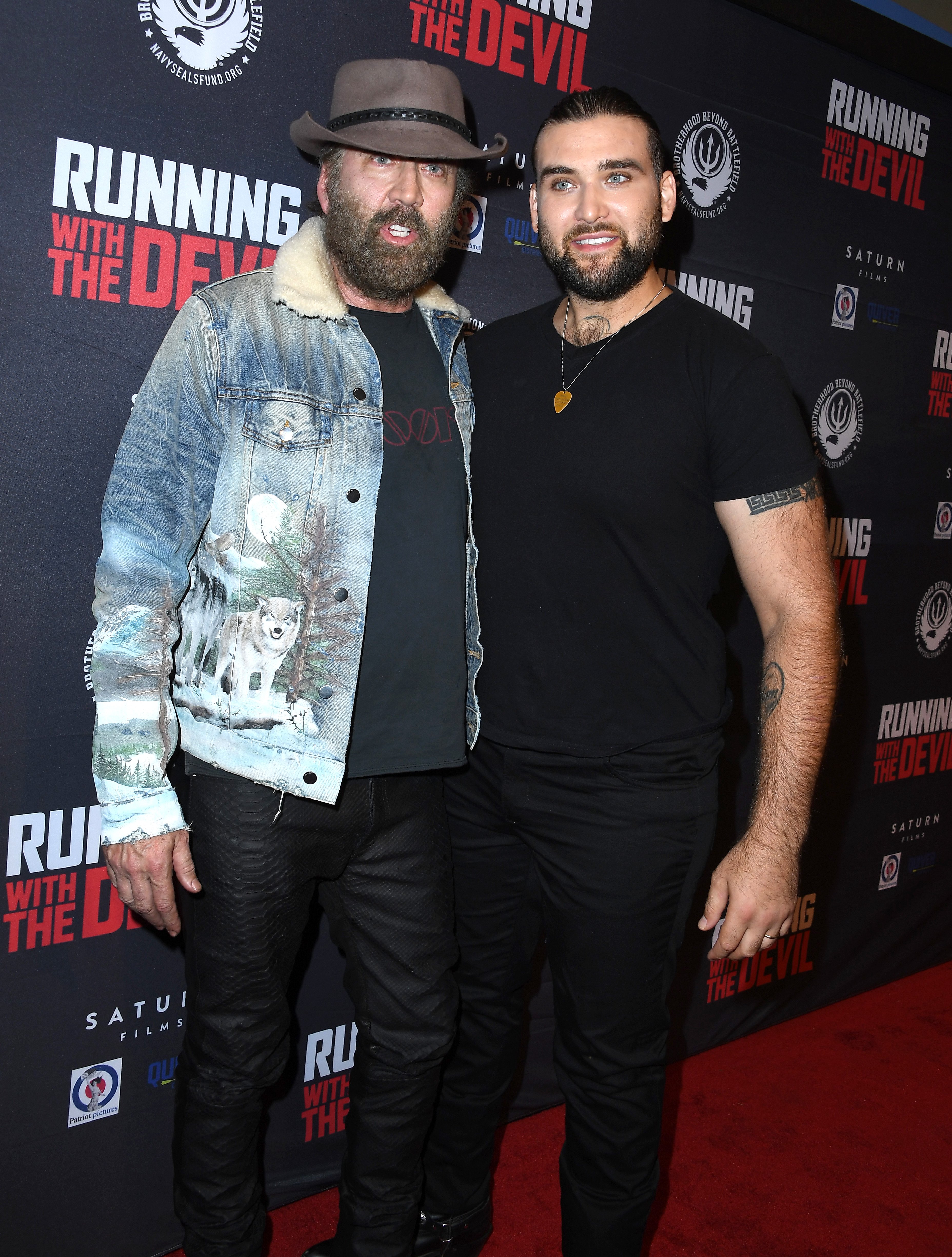 Nicolas Cage and Weston Coppola Cage arrives at the Premiere Of Quiver Distribution's "Running With The Devil" at Writers Guild Theater on September 16, 2019 in Beverly Hills, California. | Source: Getty Images